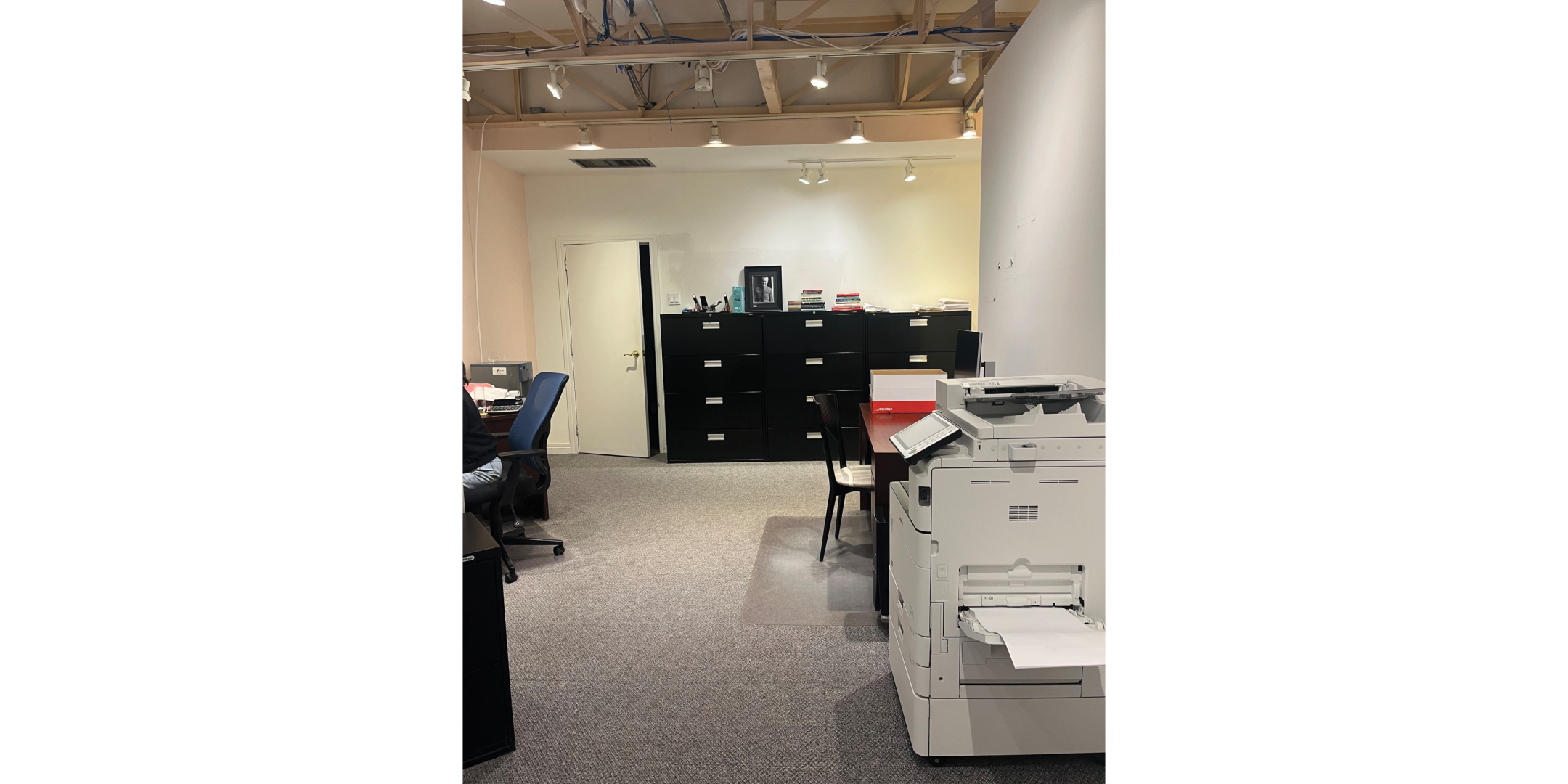 225 Macpherson Avenue provides an open workspace with office furniture and storage.