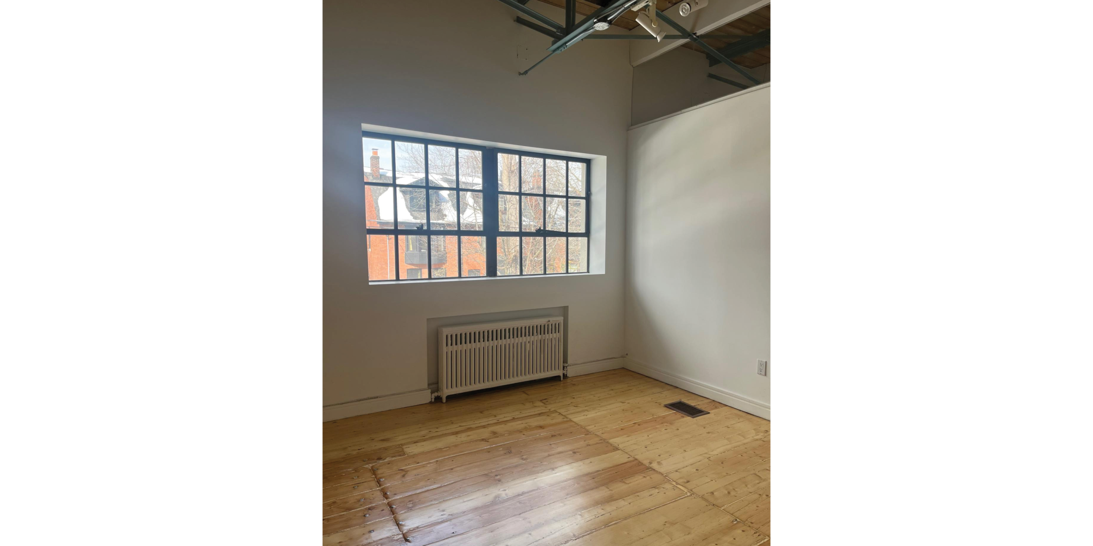 225 Macpherson Avenue offers a bright office with high ceilings and large windows.