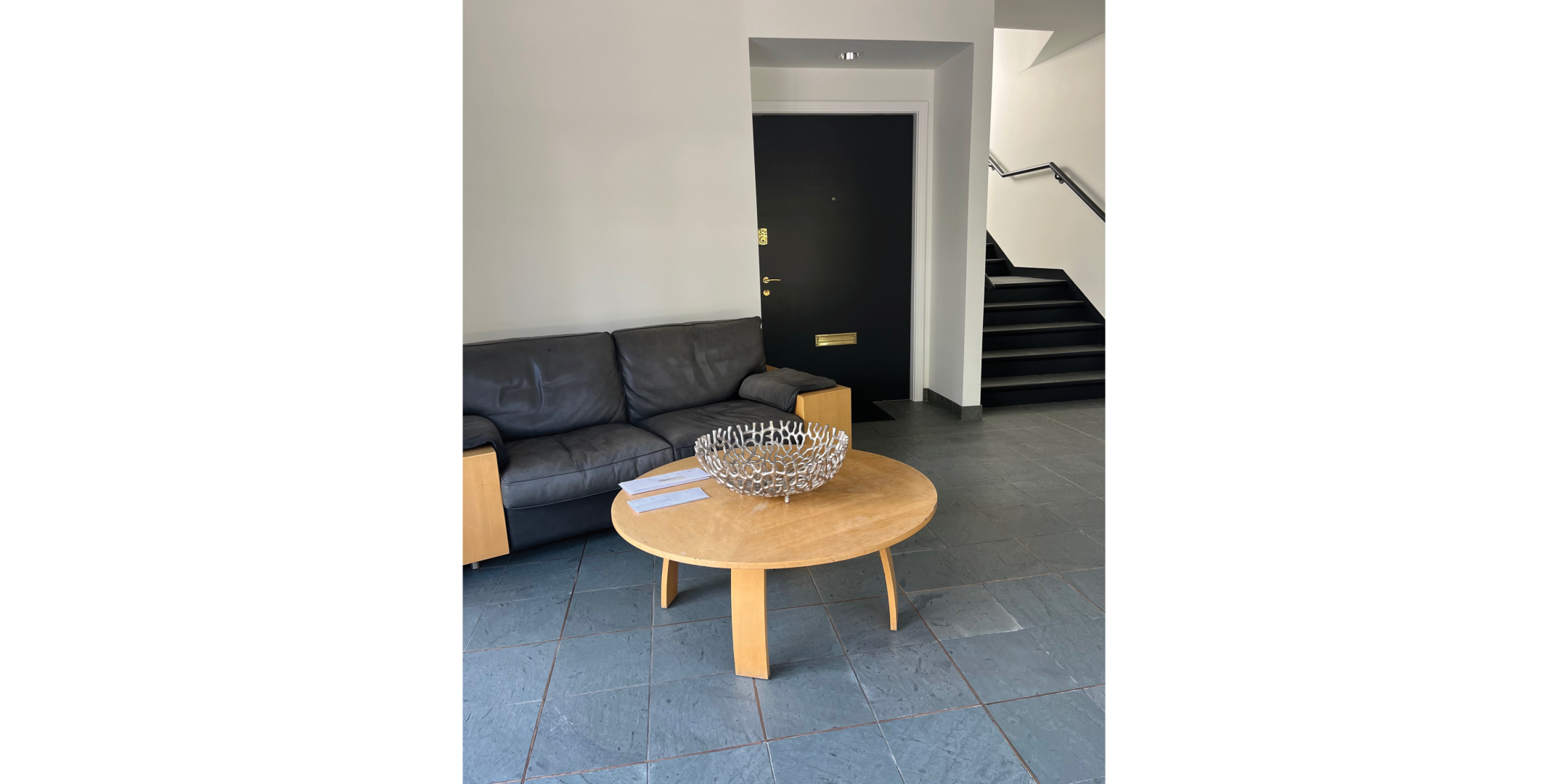 225 Macpherson Avenue includes a stylish lobby with seating and stair access.