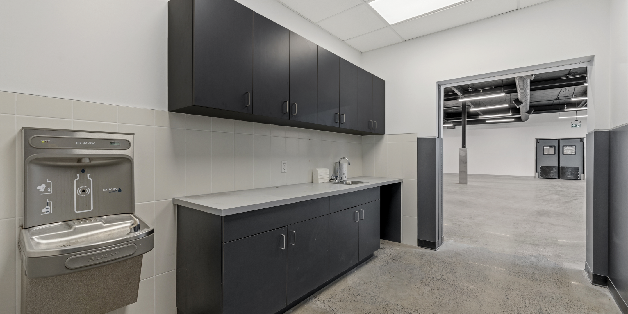 30 Bermondsey Road cabinetry with sink and water refilling station