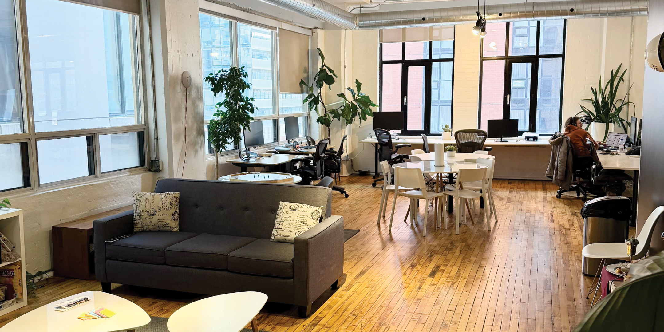 317 Adelaide Street W open workspace with desks and seating area