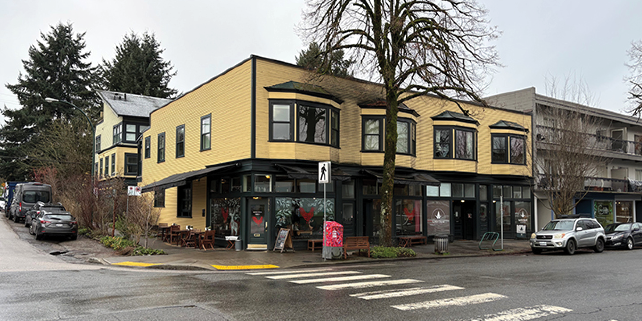 3589-3599 Commercial Street building exterior showing main entrance, main intersection, and street parking