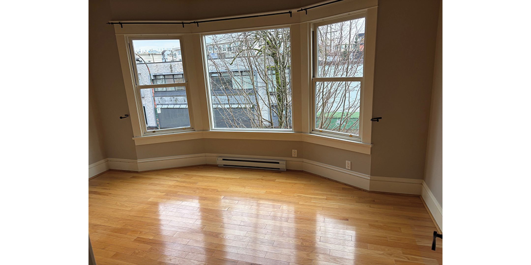 3589-3599 Commercial Street interior living area with bay window