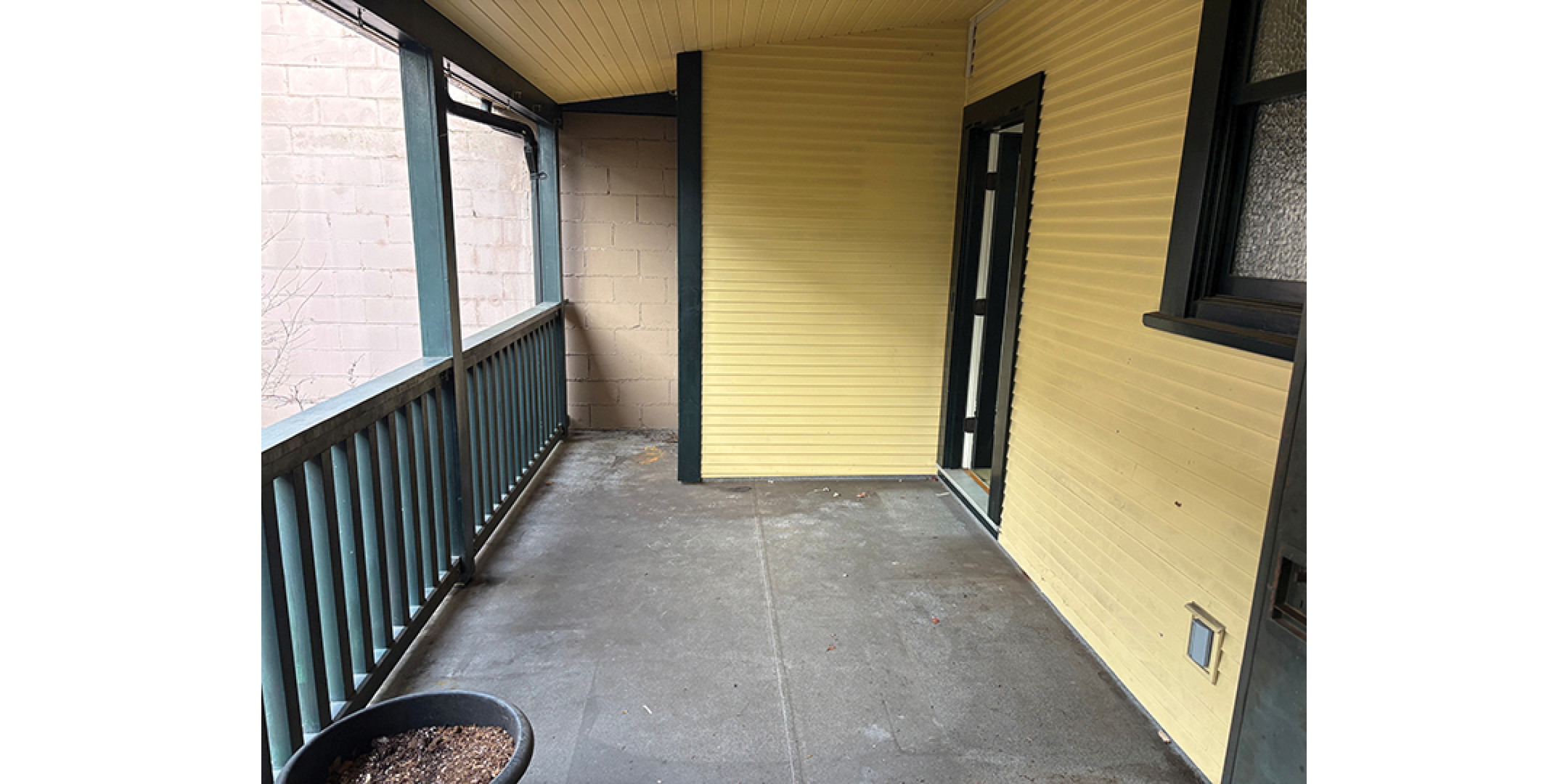 3589-3599 Commercial Street building exterior rear upper balcony