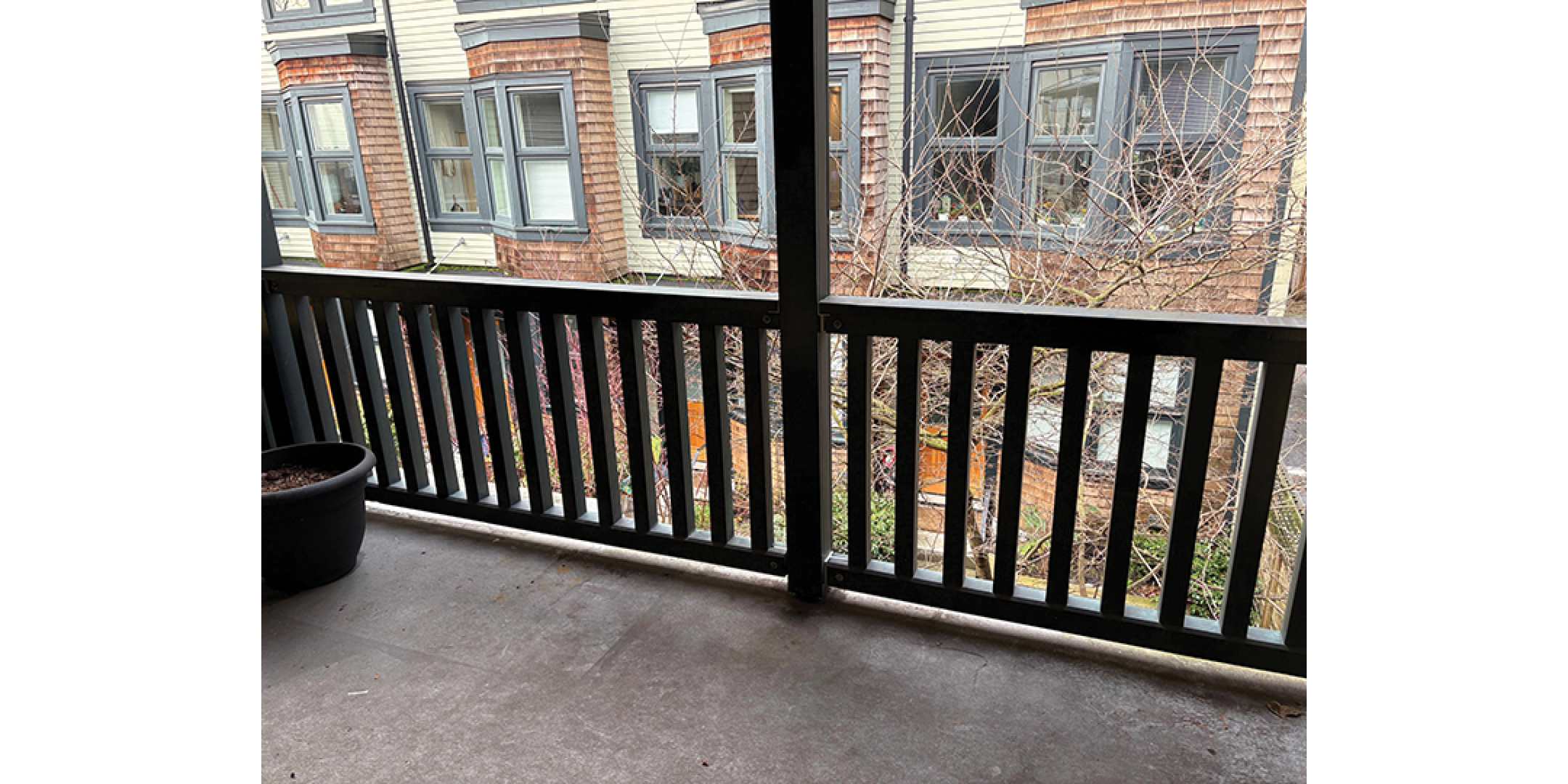 3589-3599 Commercial Street building exterior rear upper balcony view