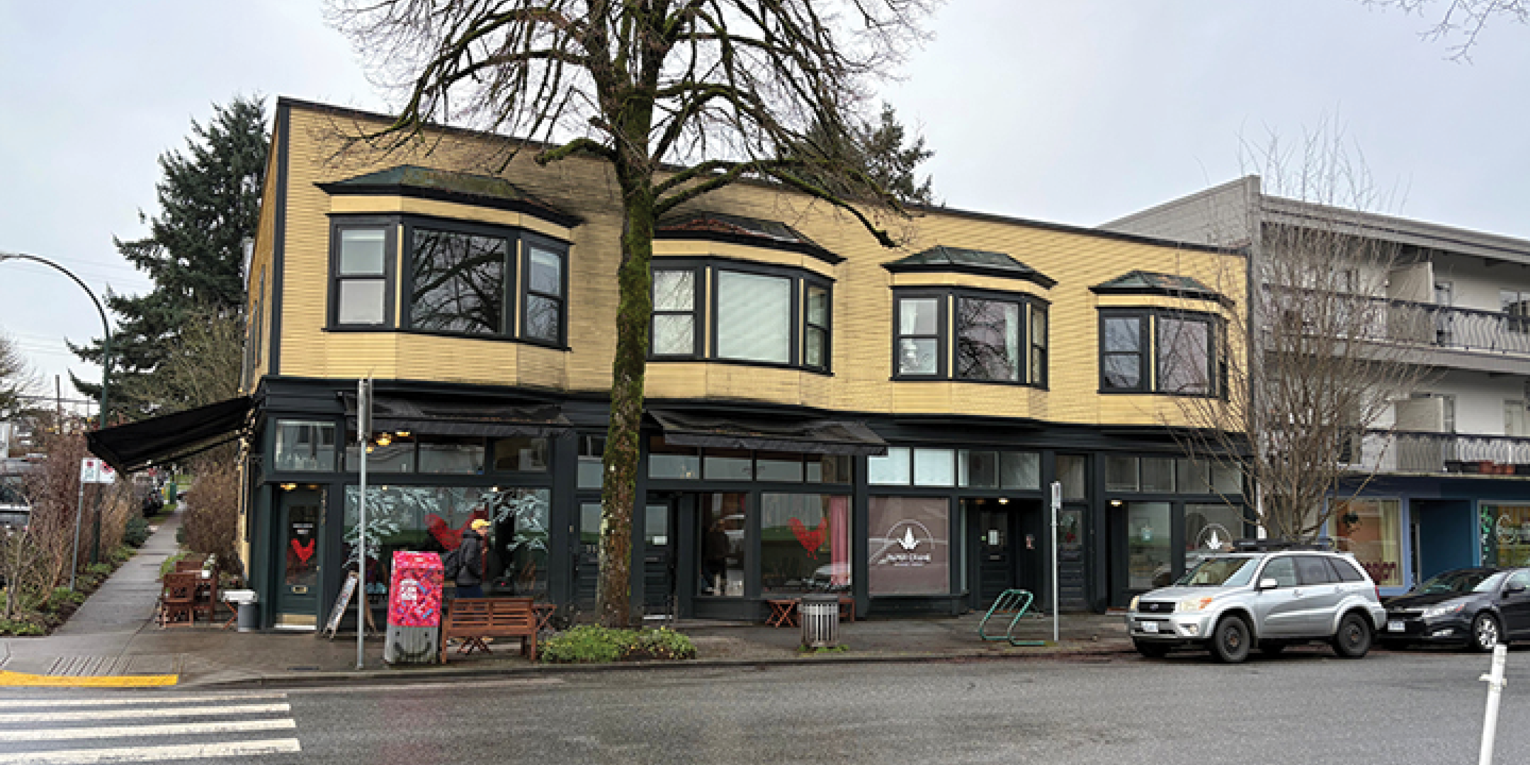 3589-3599 Commercial Street building exterior showing main entrance, main intersection, and street parking