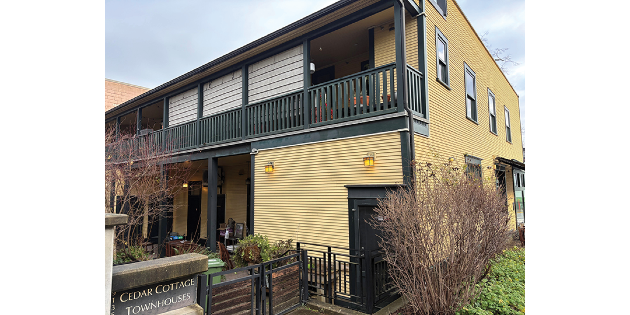 3589-3599 Commercial Street building exterior back entrance and rear balconies