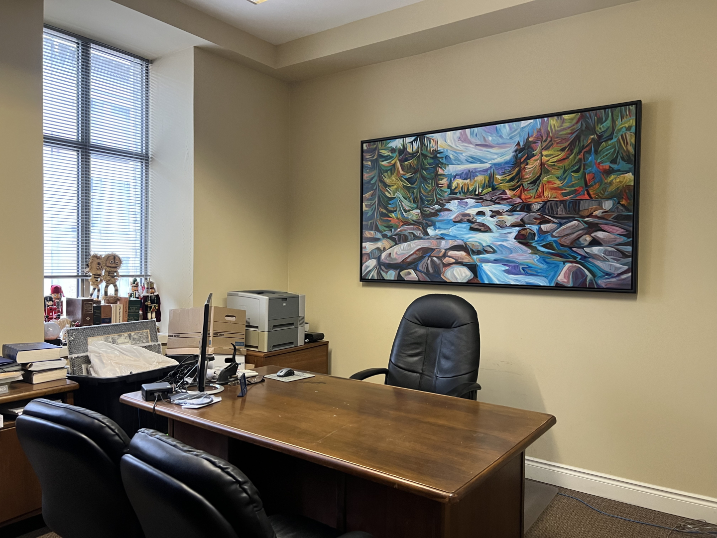 372 Bay Street office with a big window on the left side of the desk