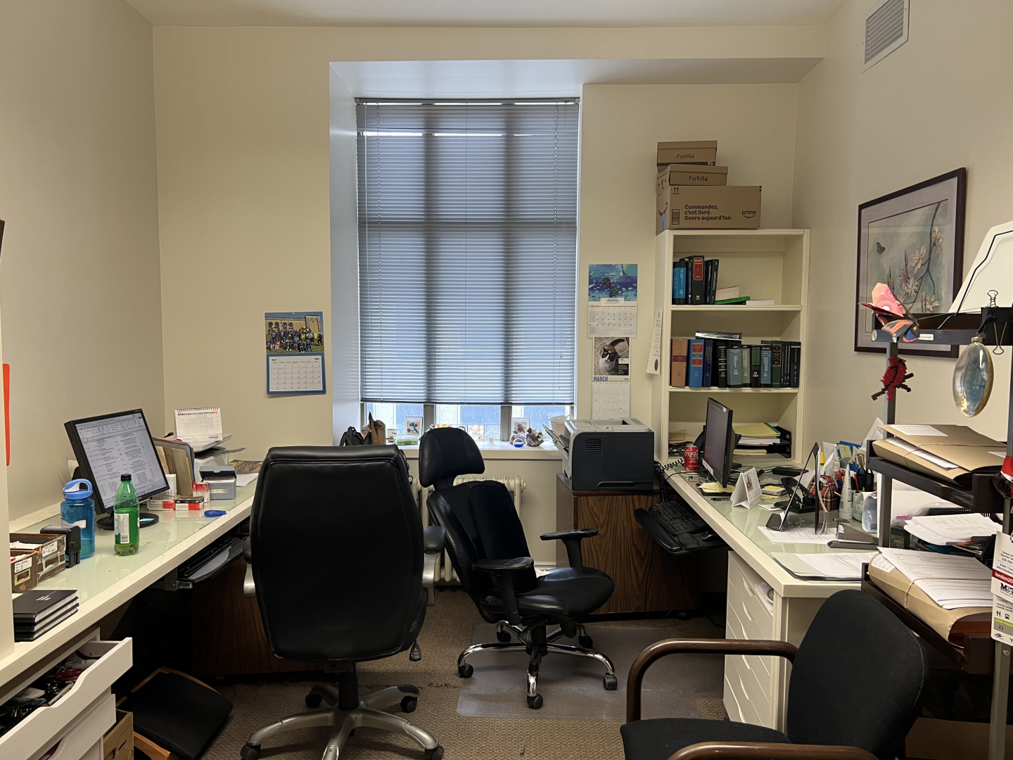 372 Bay Street office with a window overlooking several desks and chairs