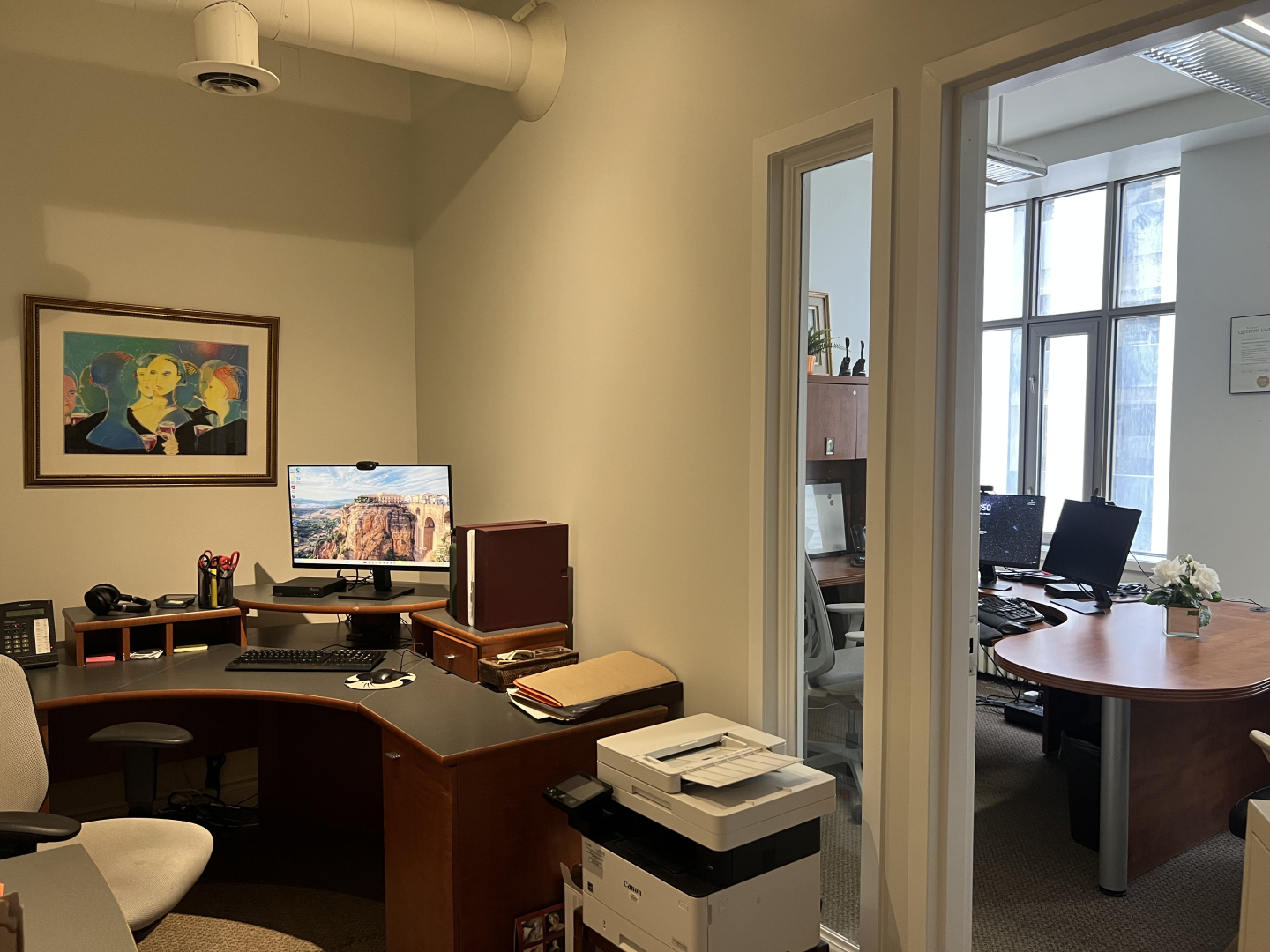 372 Bay Street office with L-shaped desk and chairs