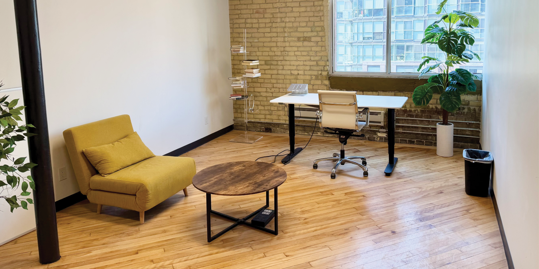 495-517 Wellington Street W office with sofa and desk 