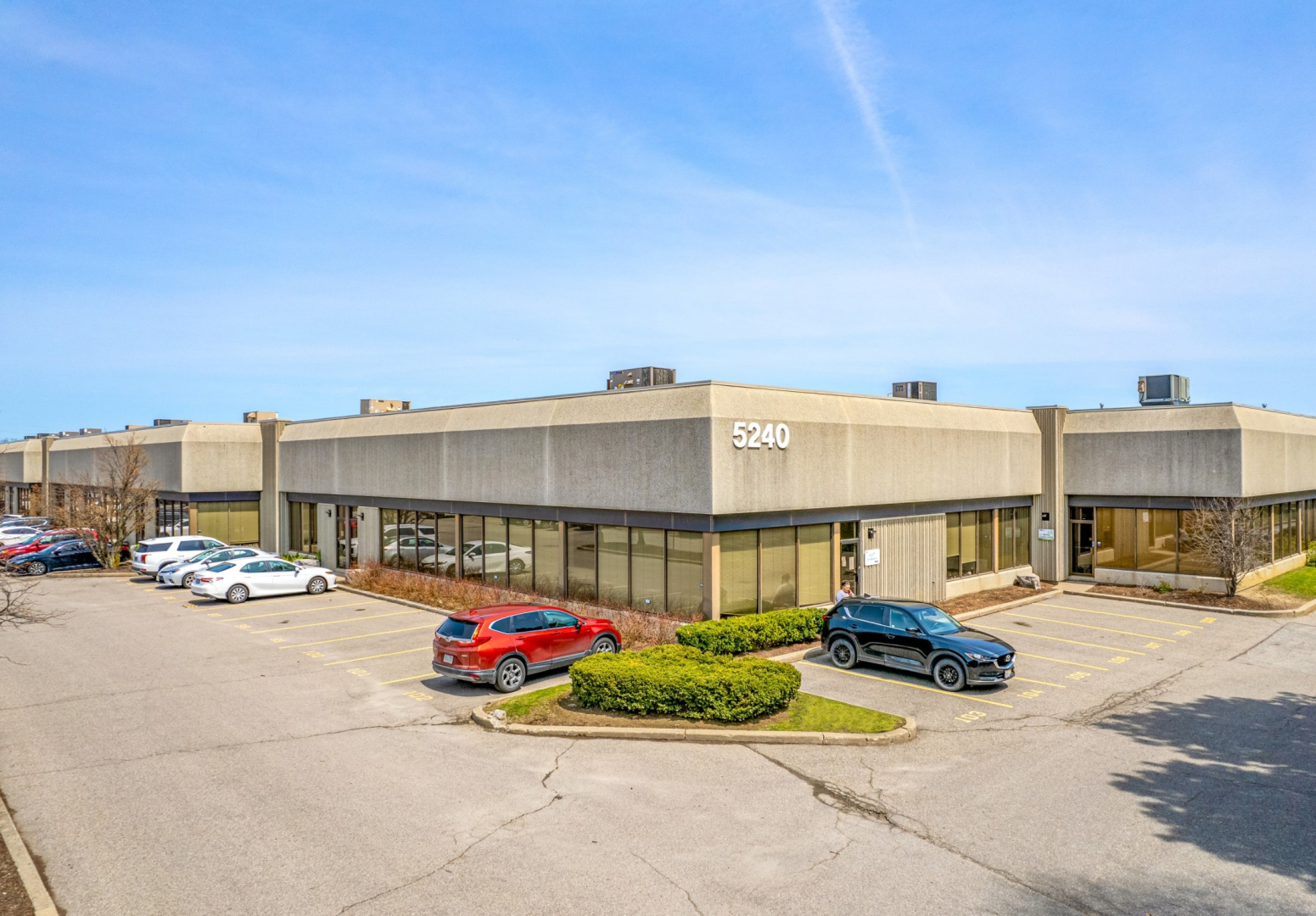 Corner of Industrial building with street number showing