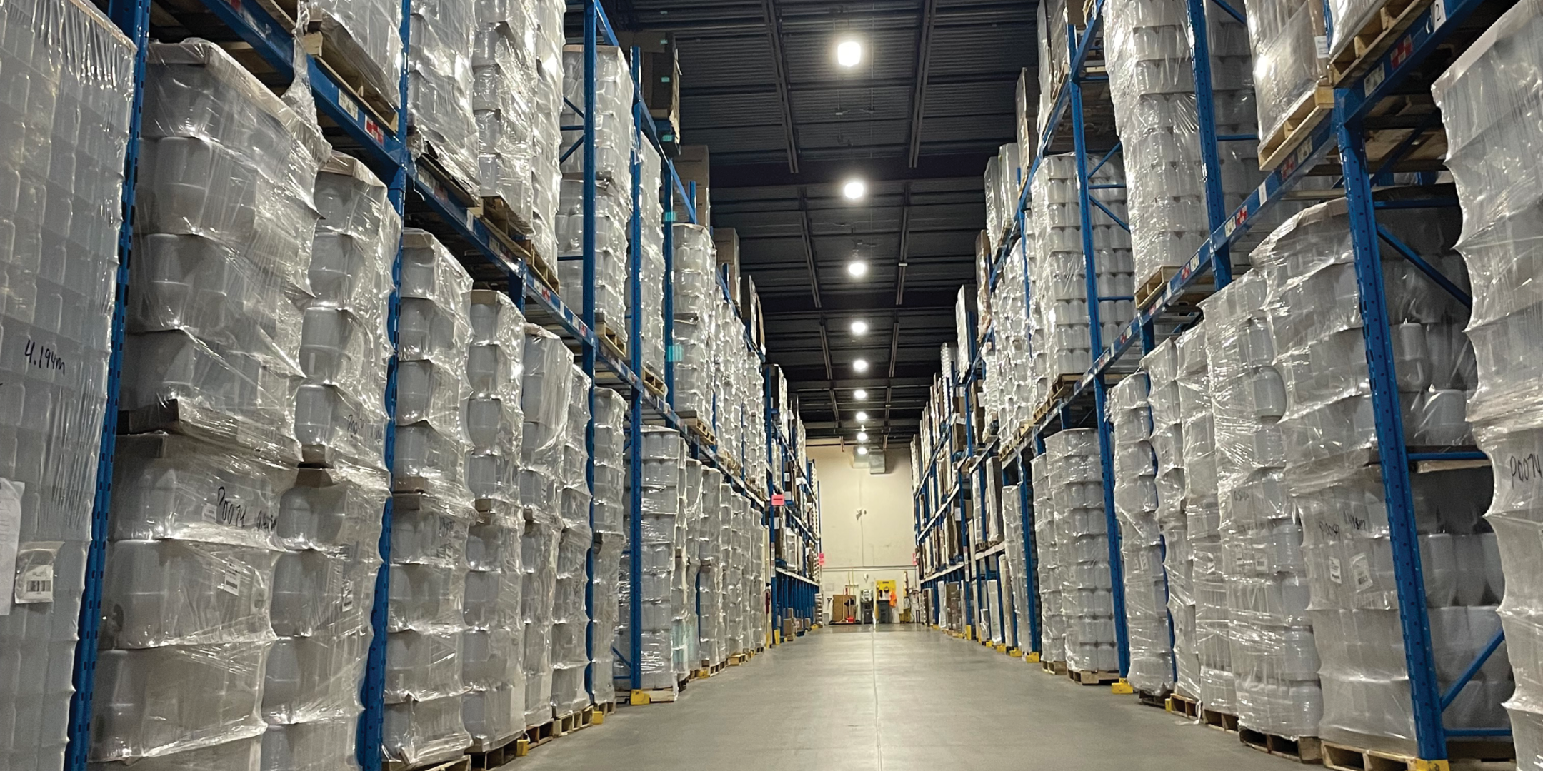 7680 Tranmere Drive 7680 Warehouse aisle with tall pallet racking on both sides.