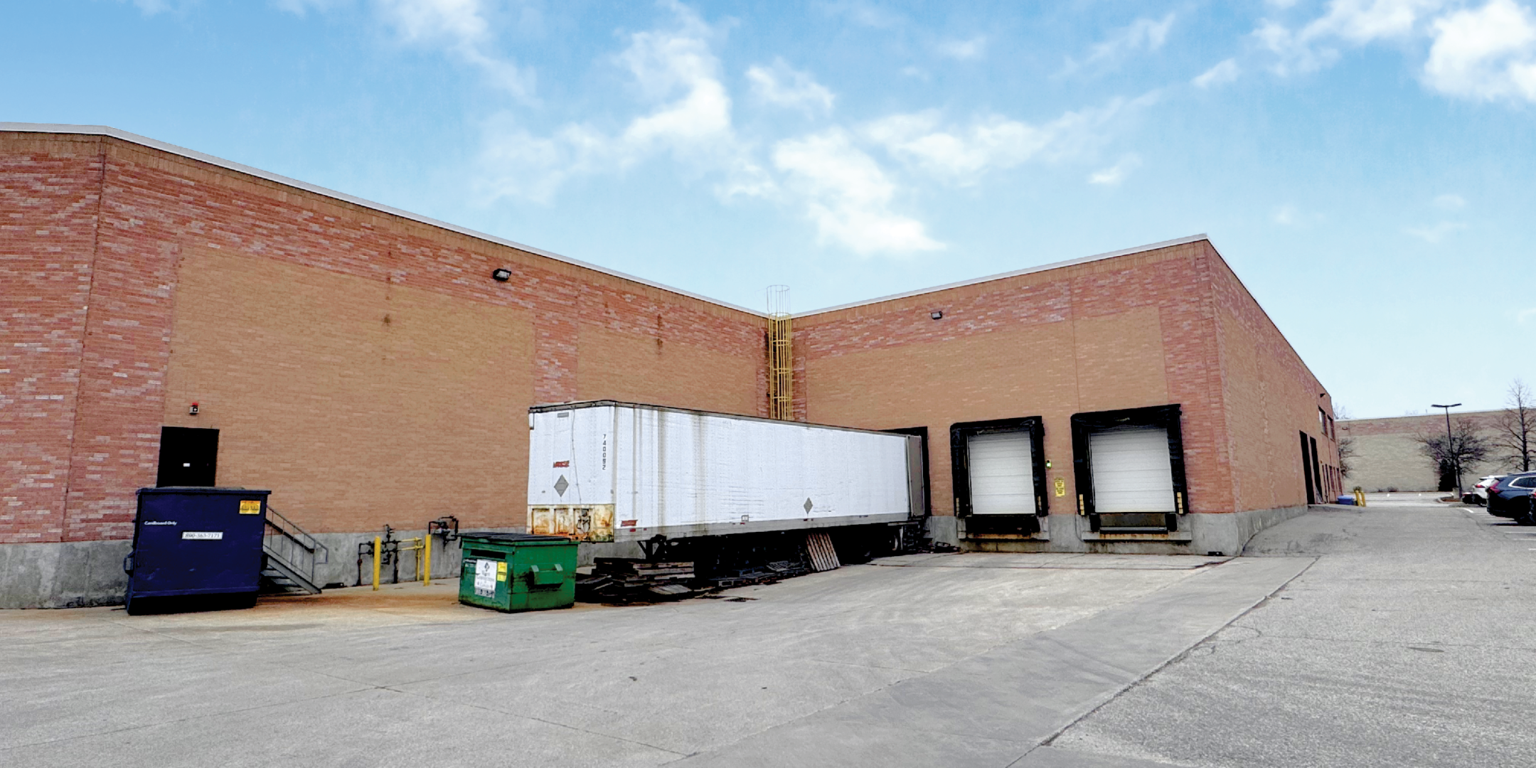 8811 Keele Street back exterior showing truck level doors and driveway