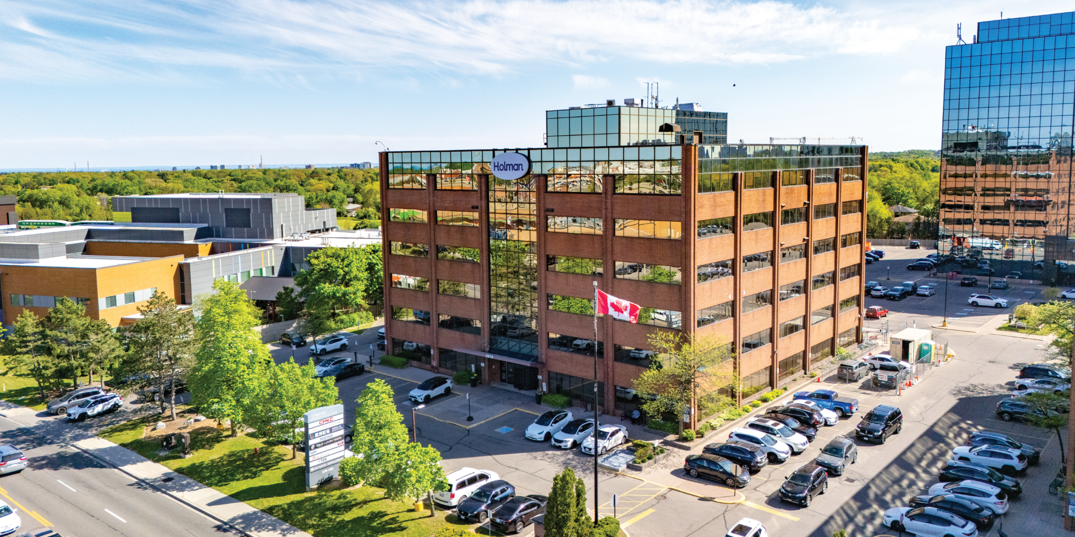 1270 Central Parkway W exterior view of office building and parking area