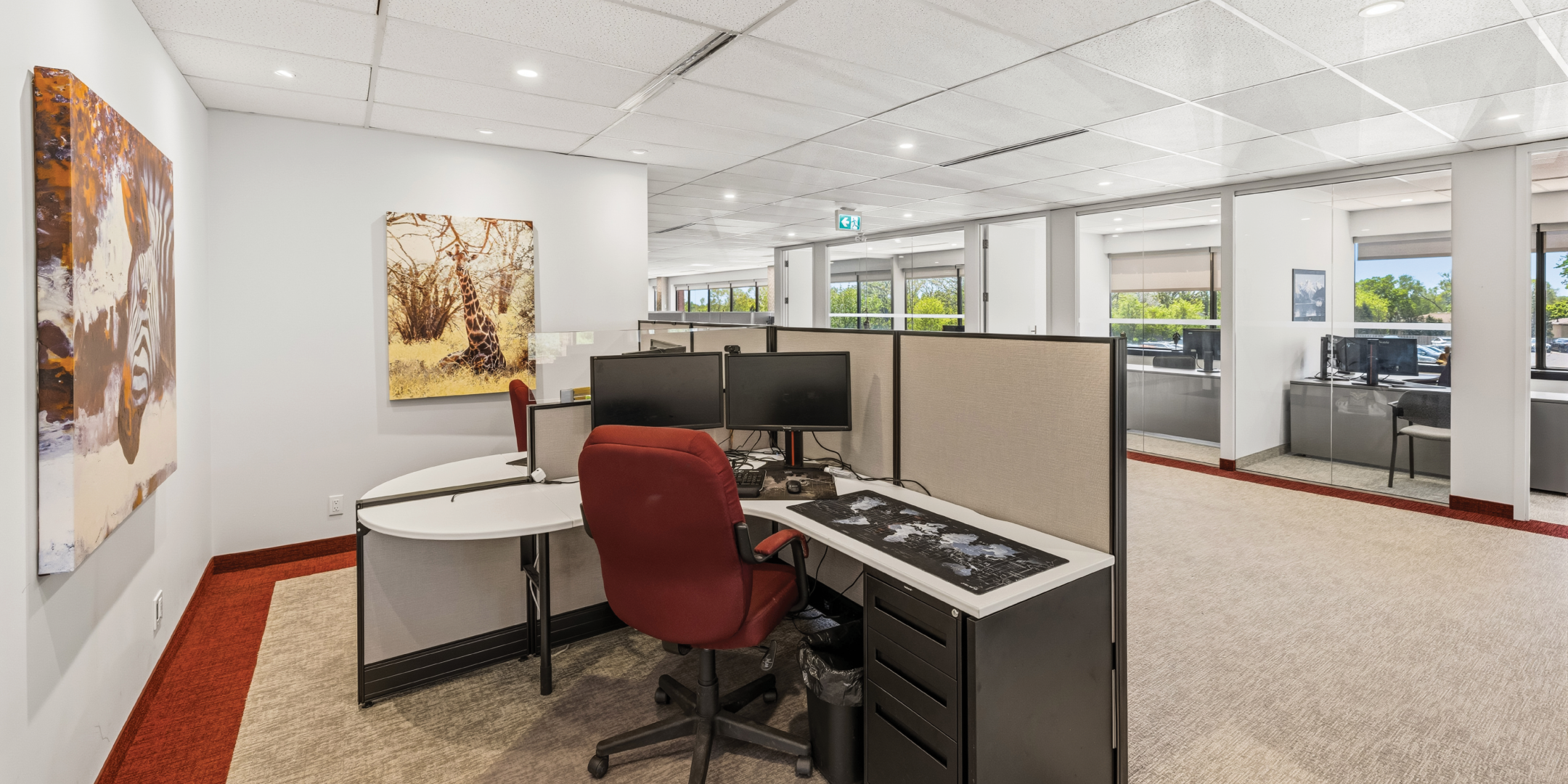 1270 Central Parkway W private workstation beside open office area