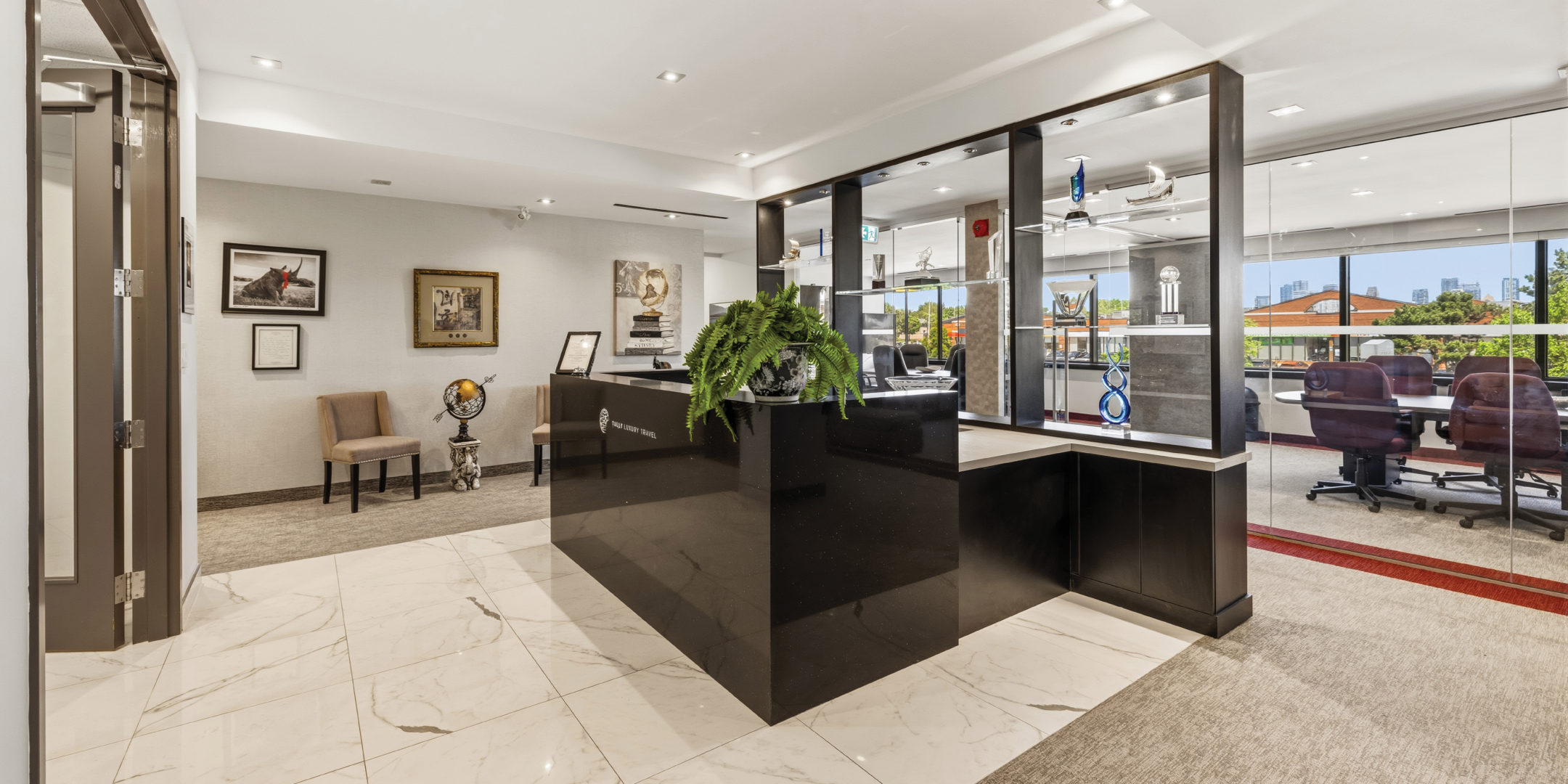 1270 Central Parkway W reception area with display shelving and seating