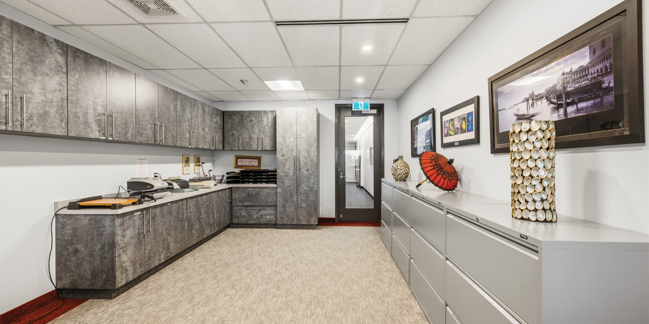 1270 Central Parkway W print room with built in cabinetry and storage