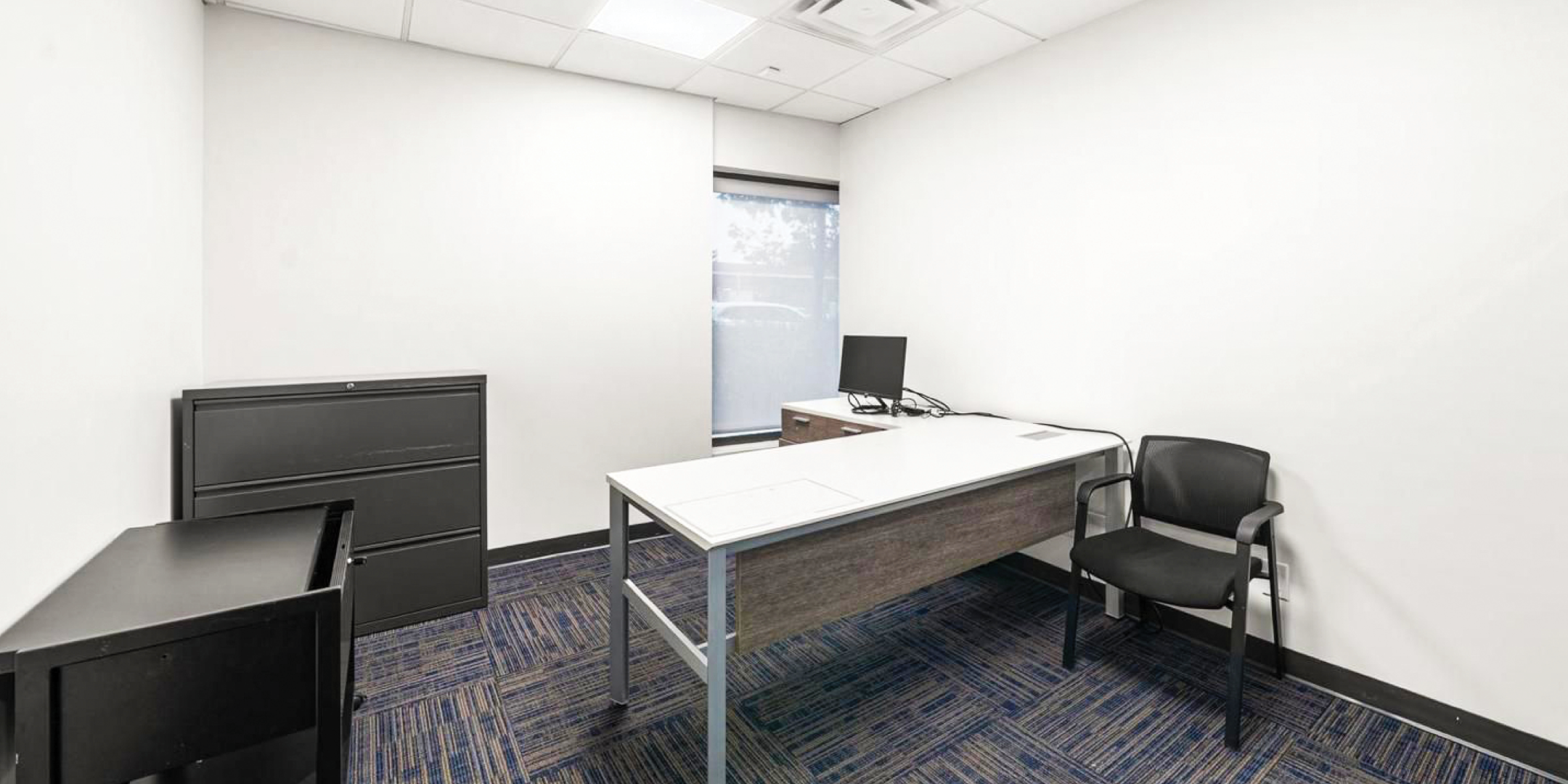 16 McAdam Ave Unit 1 & 2 Boardroom with desk and computer