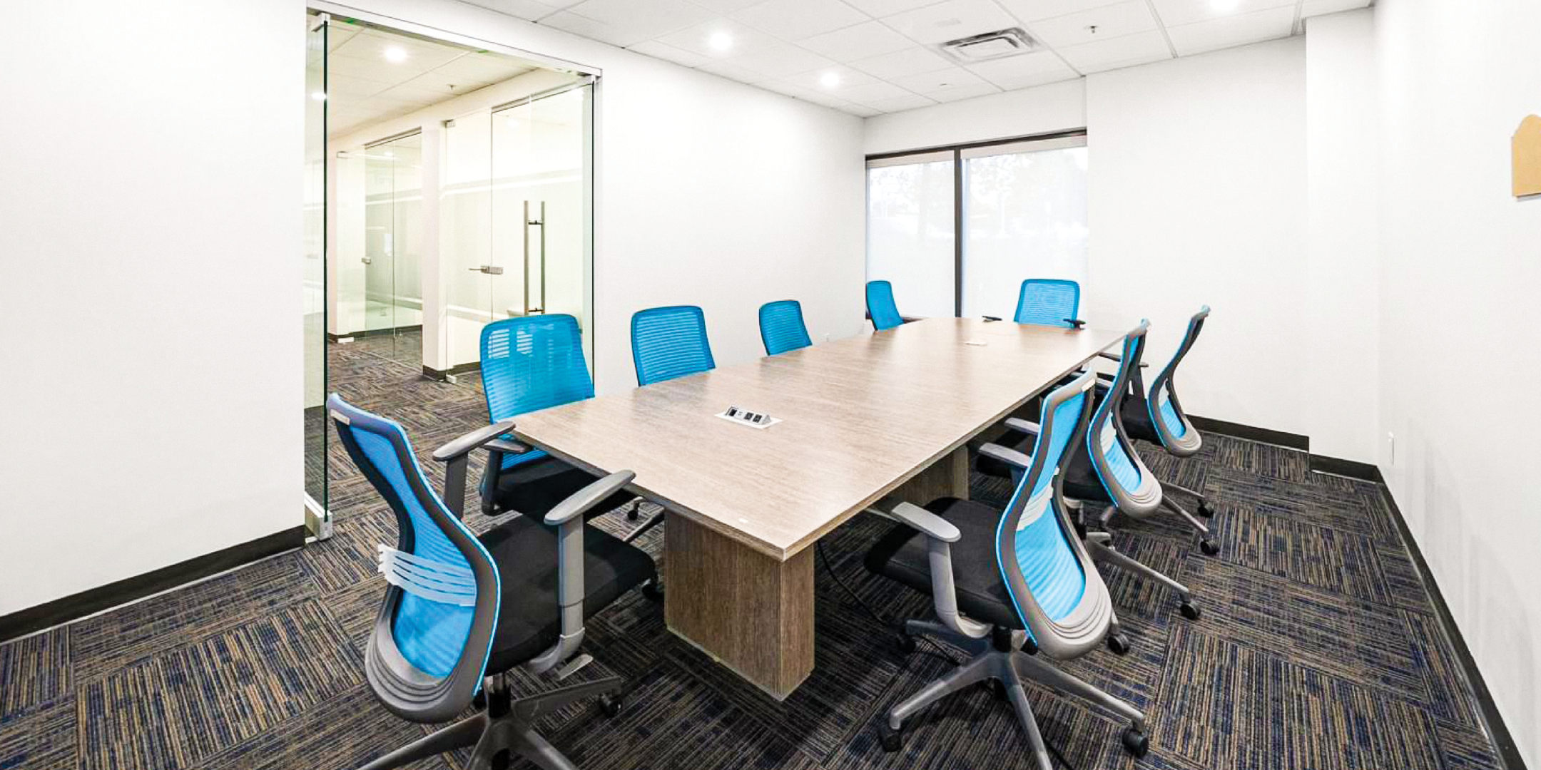16 McAdam Ave Unit 1 & 2 Boardroom with blue chairs