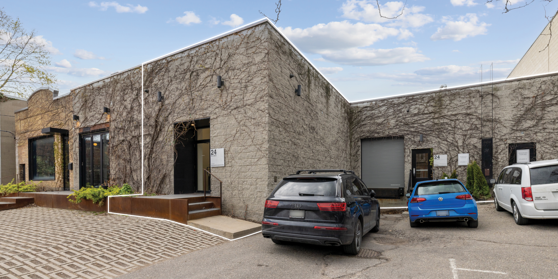 24 McGee exterior front entrance and parking area