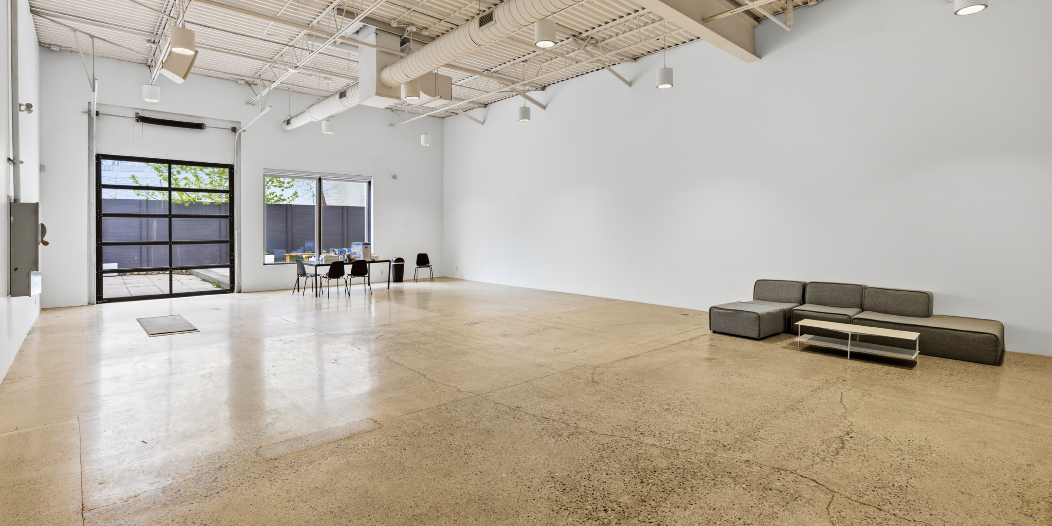 24 McGee industrial studio space with seating area