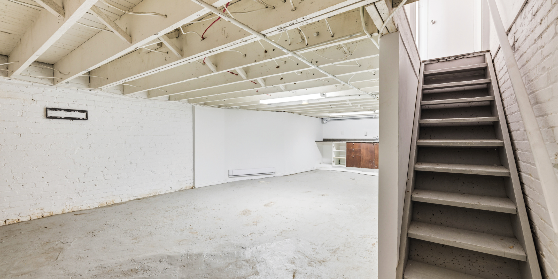 336 Kingston Road unfinished basement with stairs