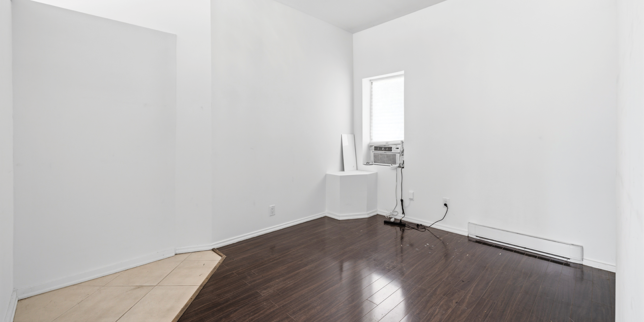 336 Kingston Road main floor corner room with window AC unit