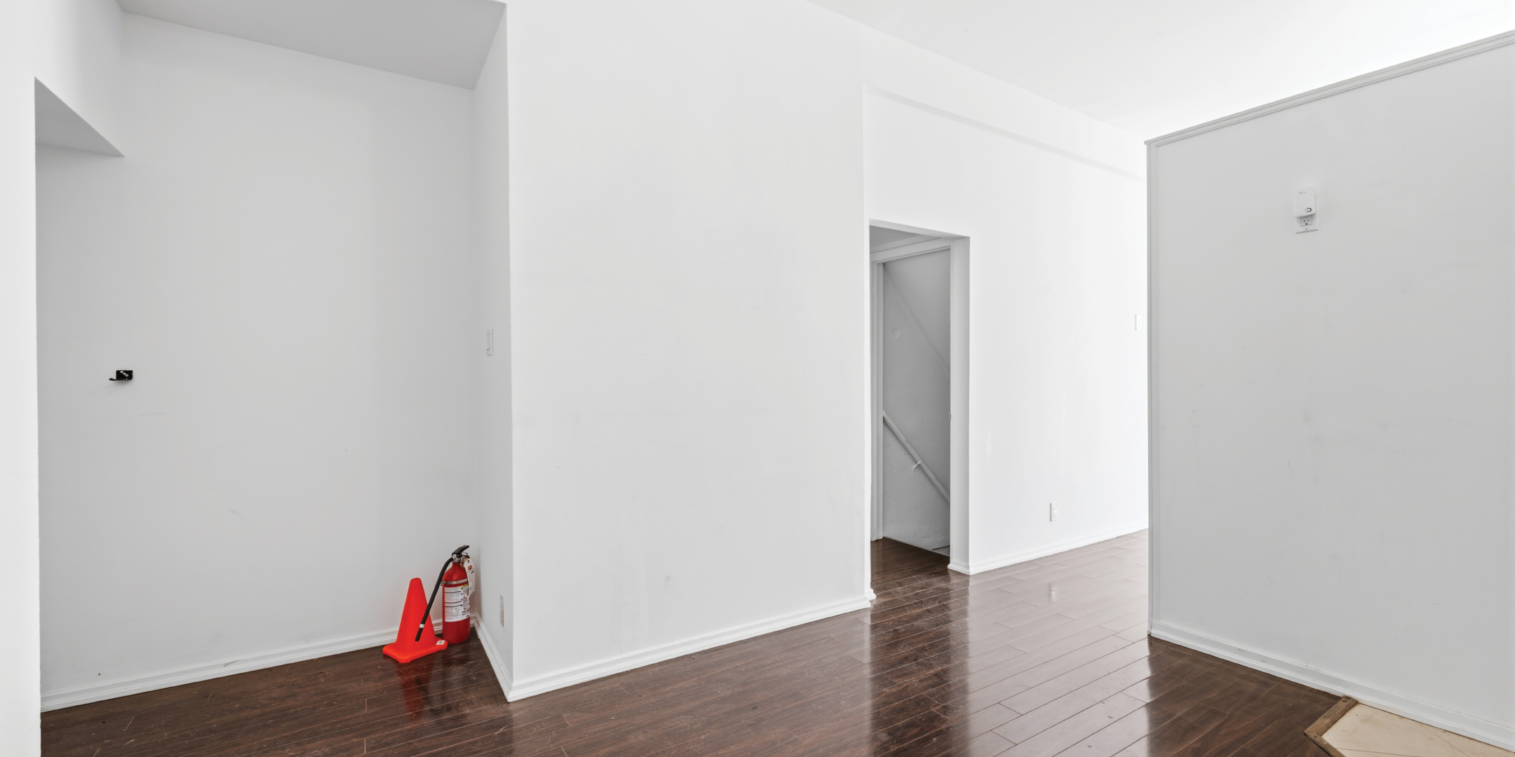 336 Kingston Road main floor interior with white walls and flooring