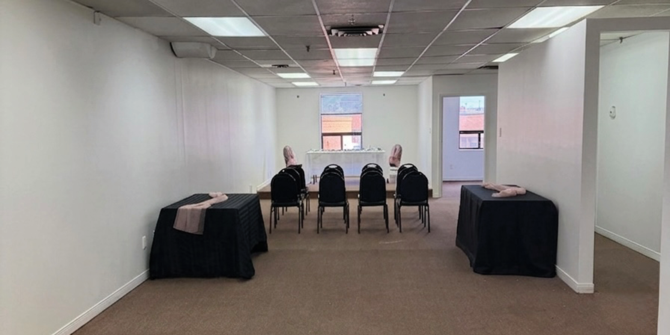 750 Oakdale Road room with tables and chair