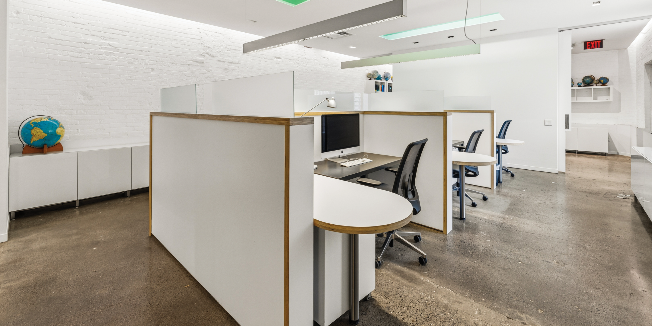 121 Logan Ave provides collaborative workstations in a bright open concept layout