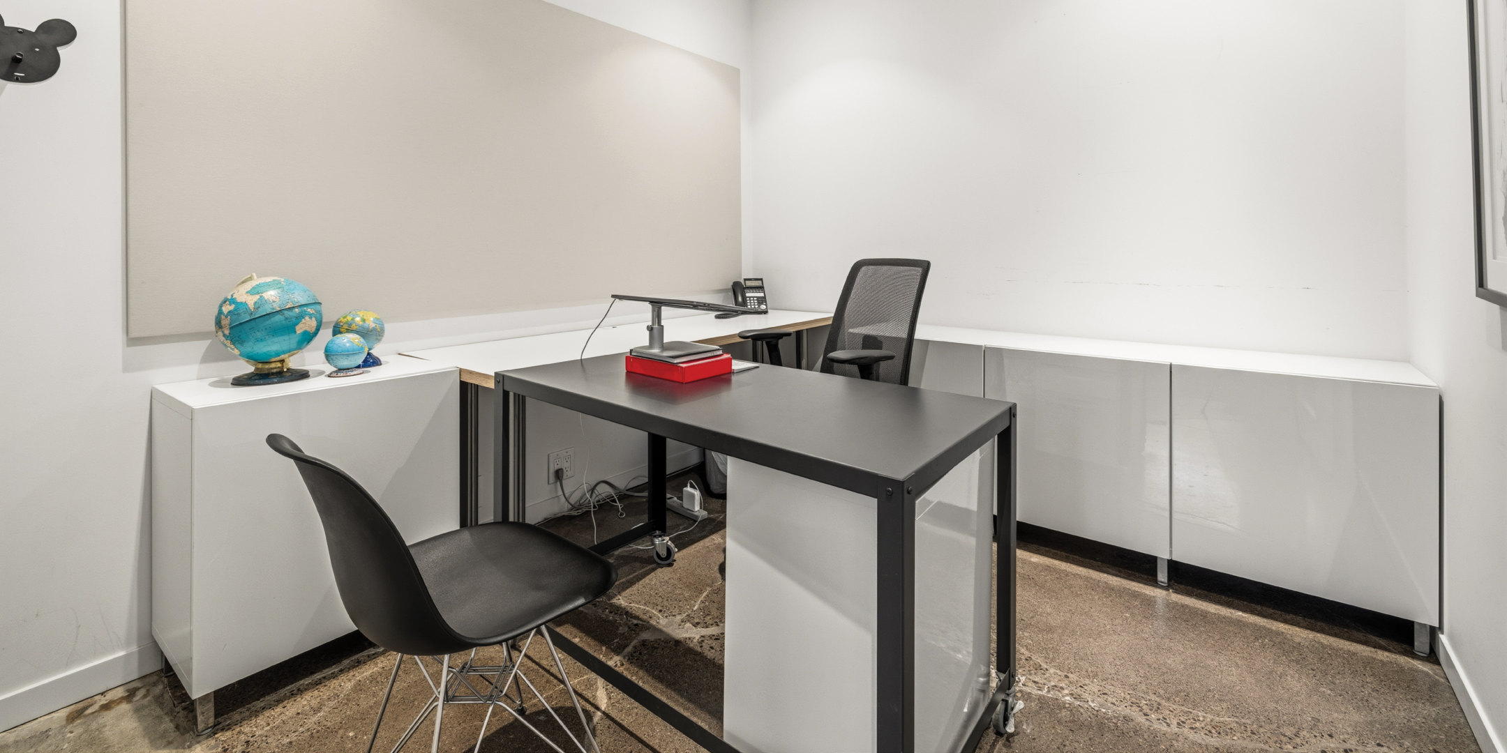 121 Logan Ave includes a private office with built in storage and workspace