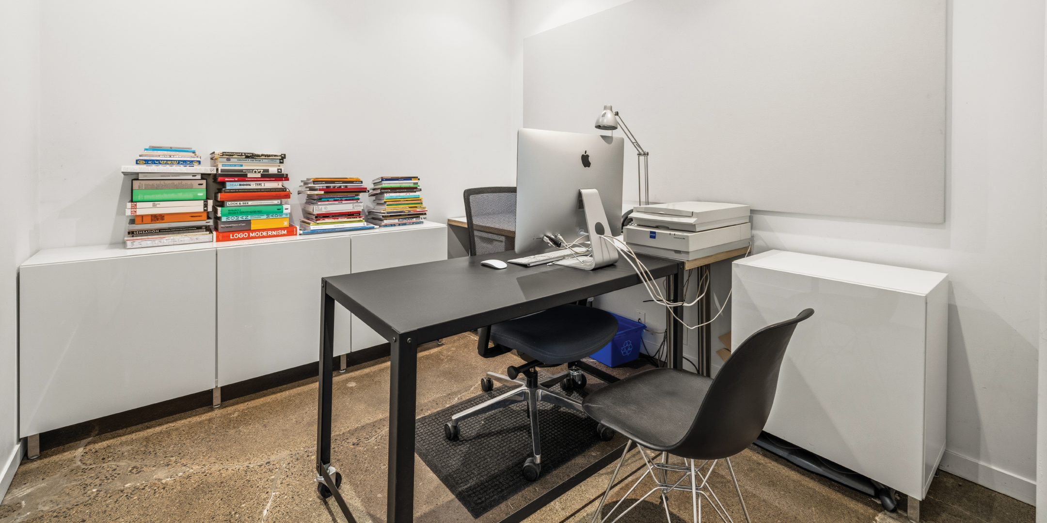121 Logan Ave features a private office with workspace and book storage