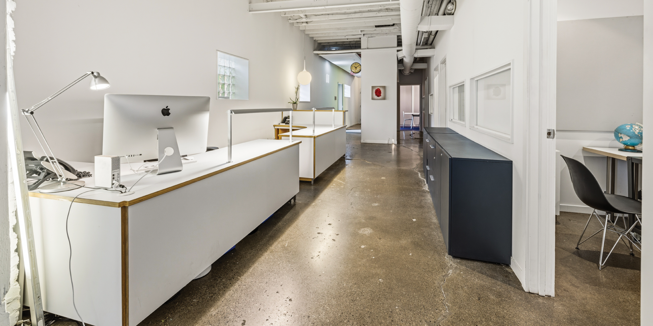 121 Logan Ave features an open office area with built in workstations
