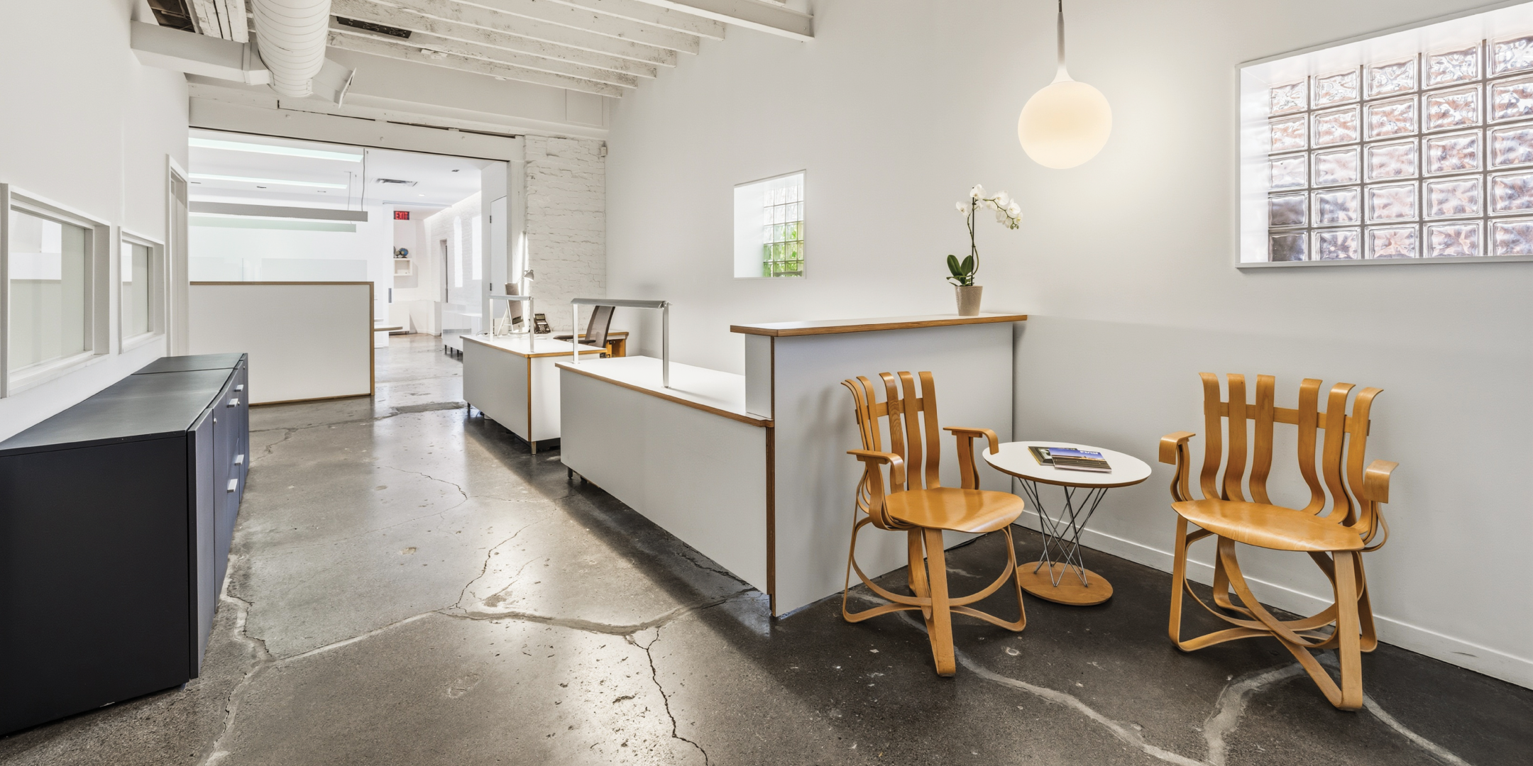 121 Logan Ave provides a reception area with seating and natural light