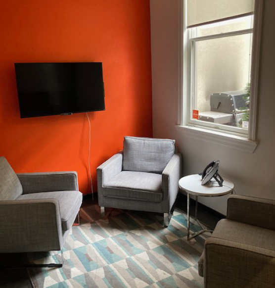 14 Birch Avenue TV room with a TV overlooking two sofas