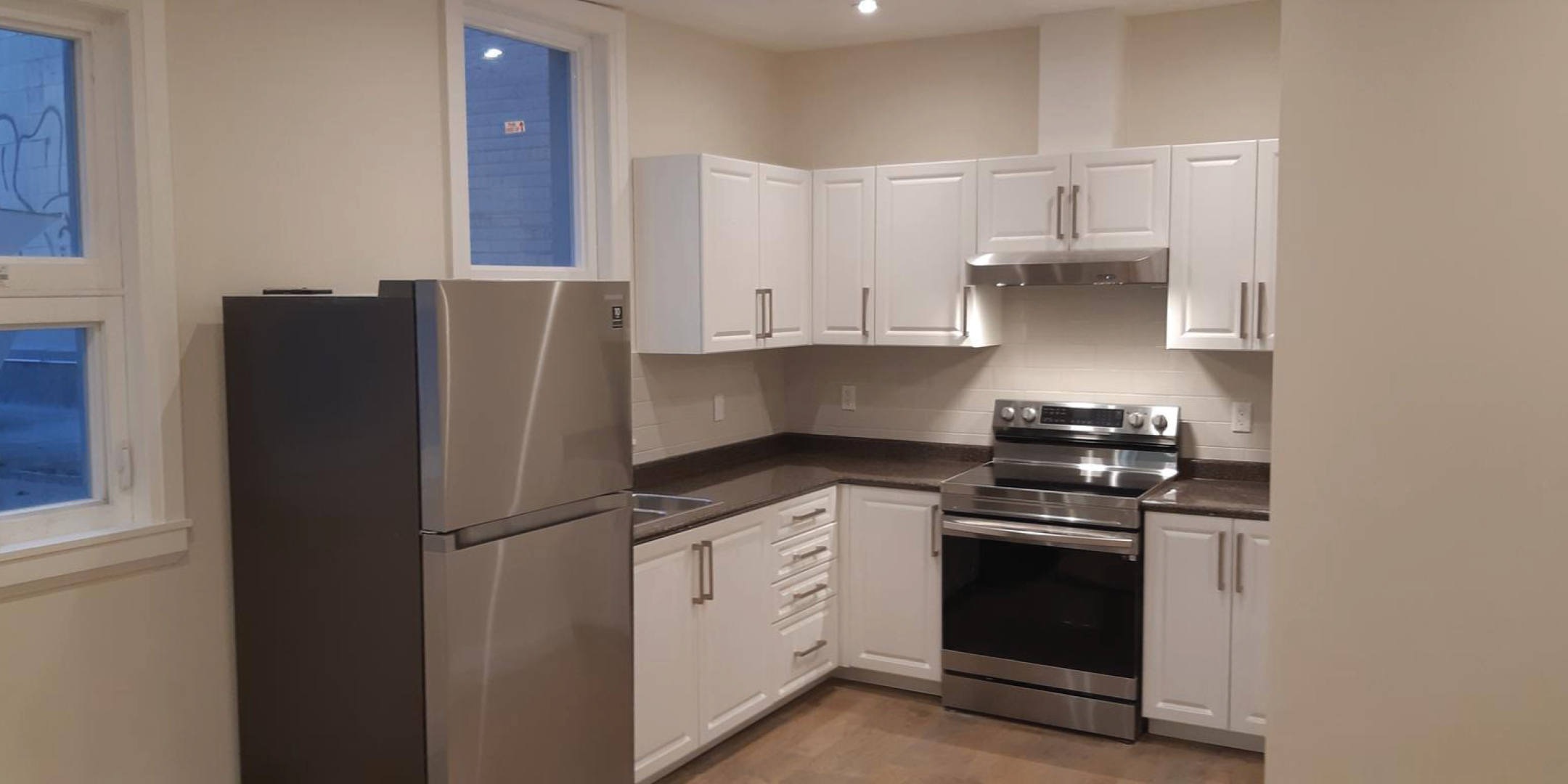 2004 Queen Street E kitchen with fridge