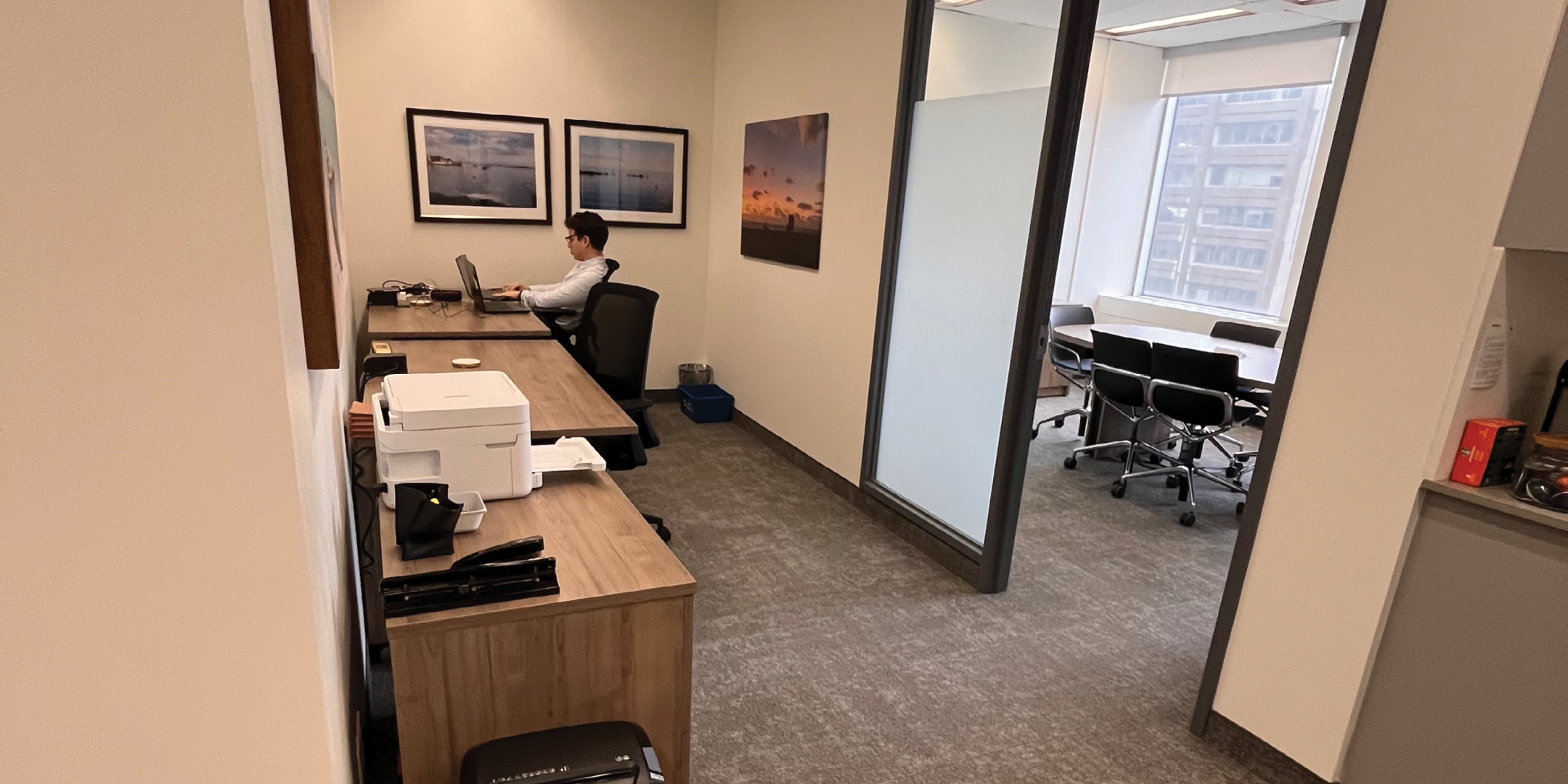 2 Bloor St W includes a bright office with workstations