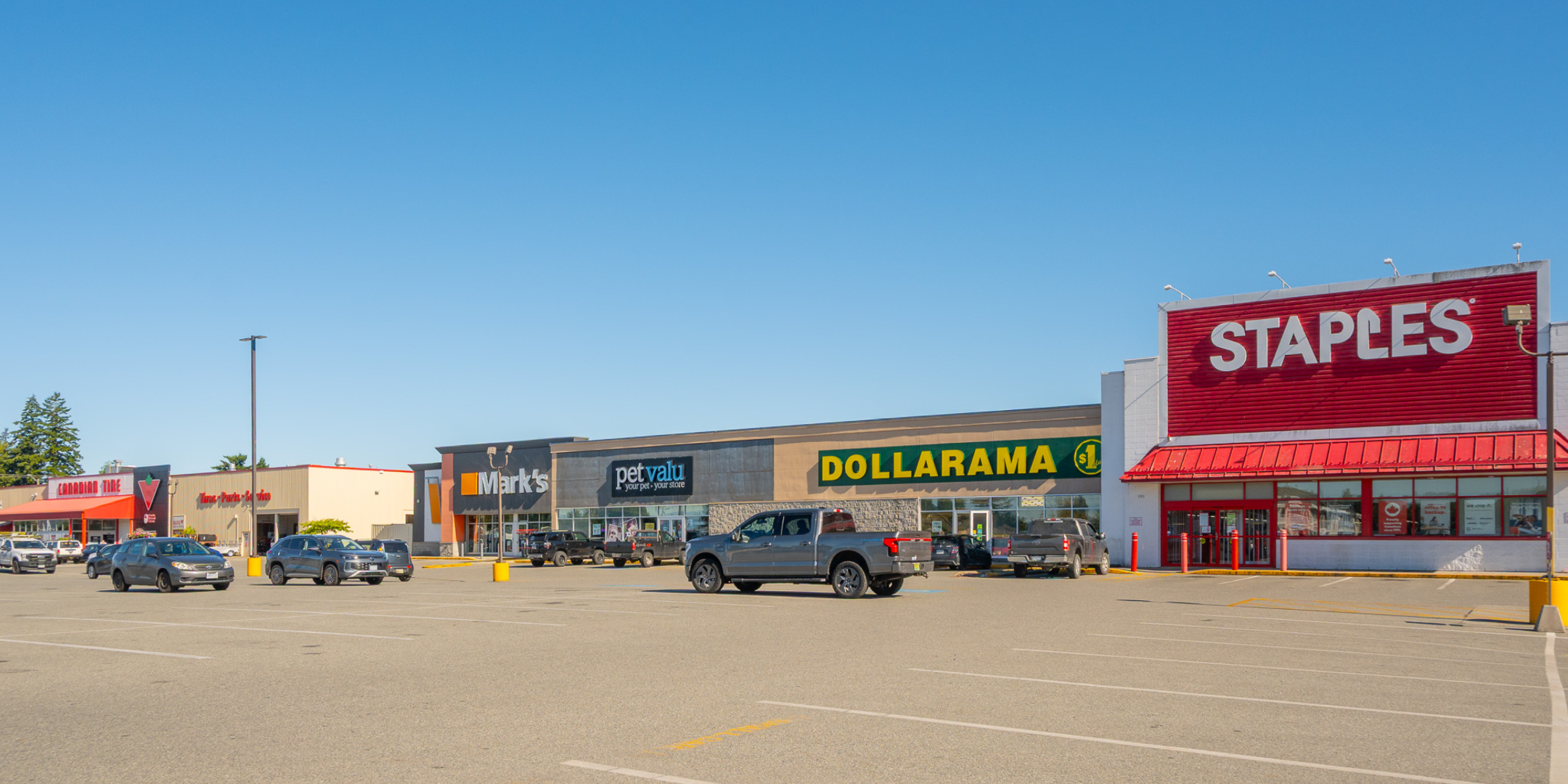 Mark's, Pet Valu, Dollarama, and Staples entrances next to one another