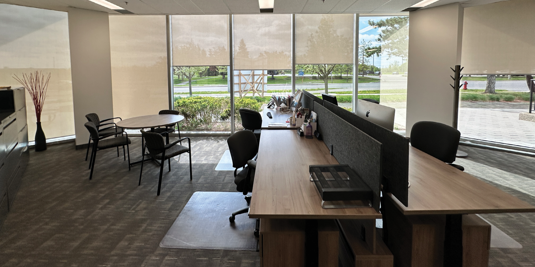 5090 Explorer Dr open office workspace with workstations and natural light.