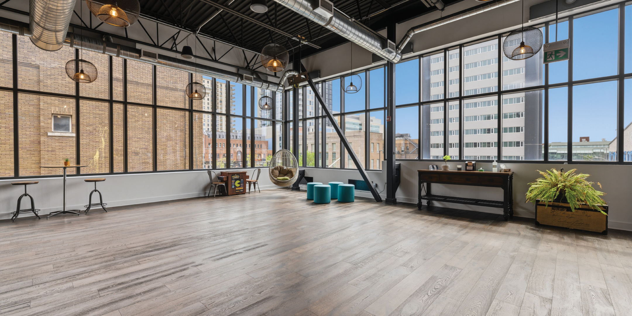 Large windows, open office area on the 3rd floor