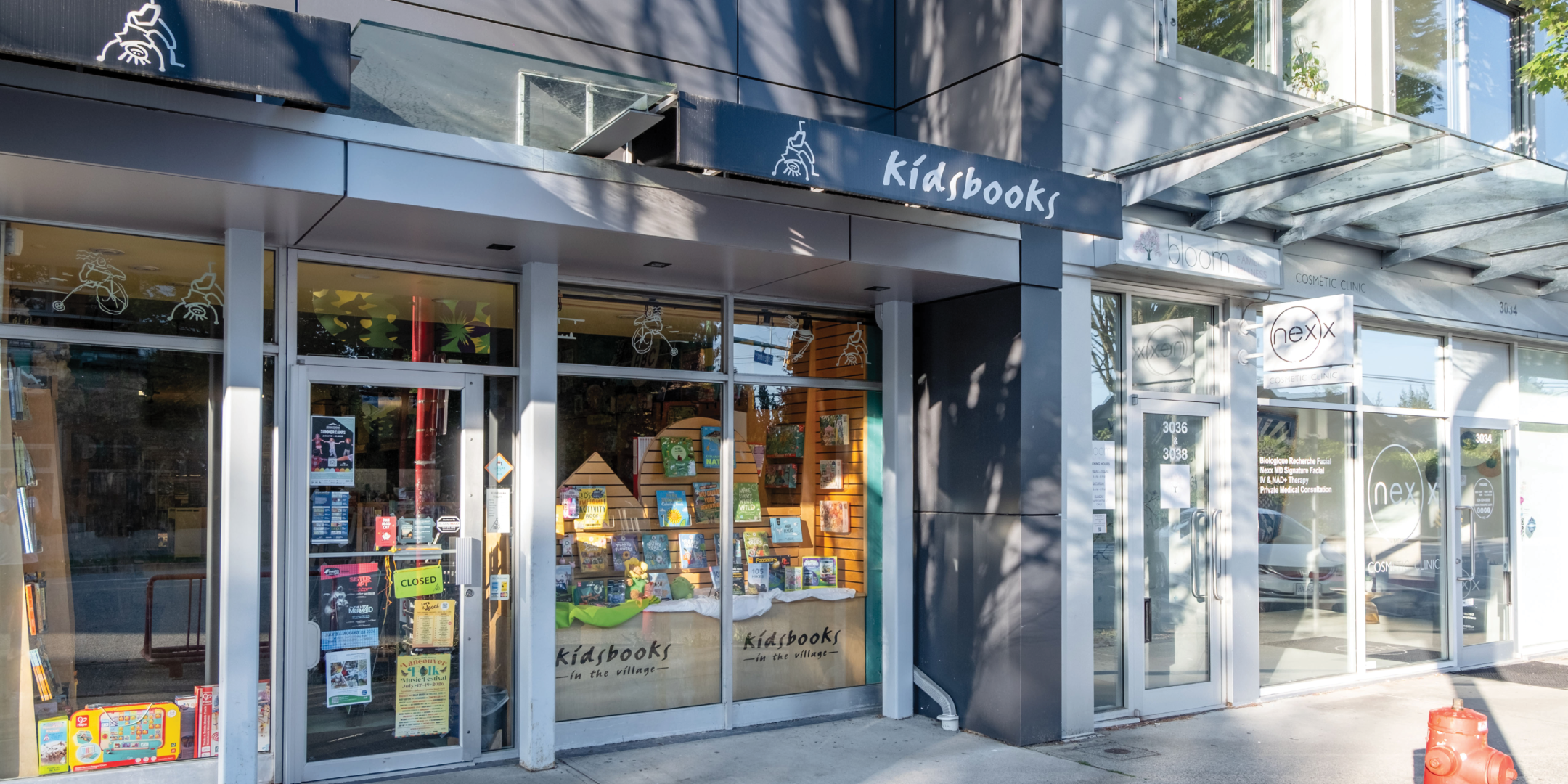 Front view of 3040 Edgemont Boulevard entrance, showing a storefront