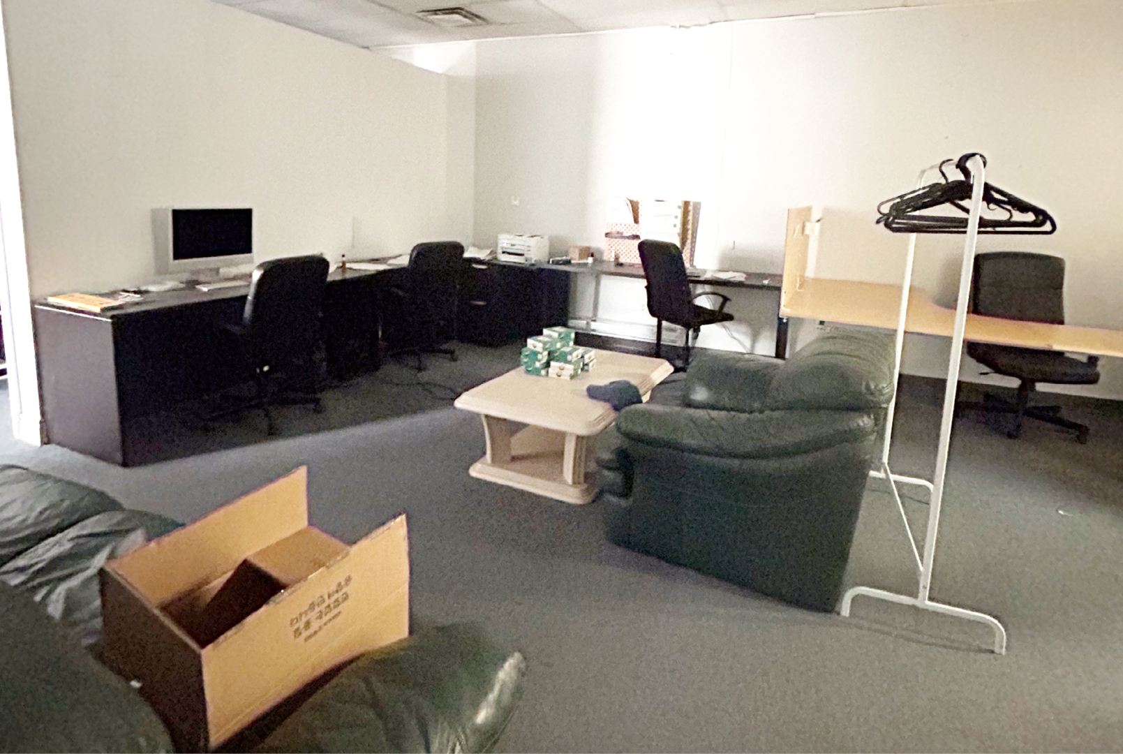 3411 McNicoll Avenue office space with work cubicles and sofa