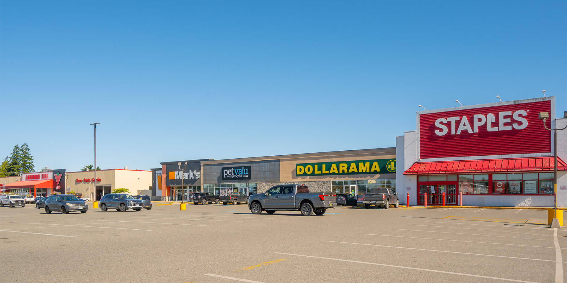 Exterior view of of Canadian Tire, Mark's, Pet Valu, Dollarama, and Staples