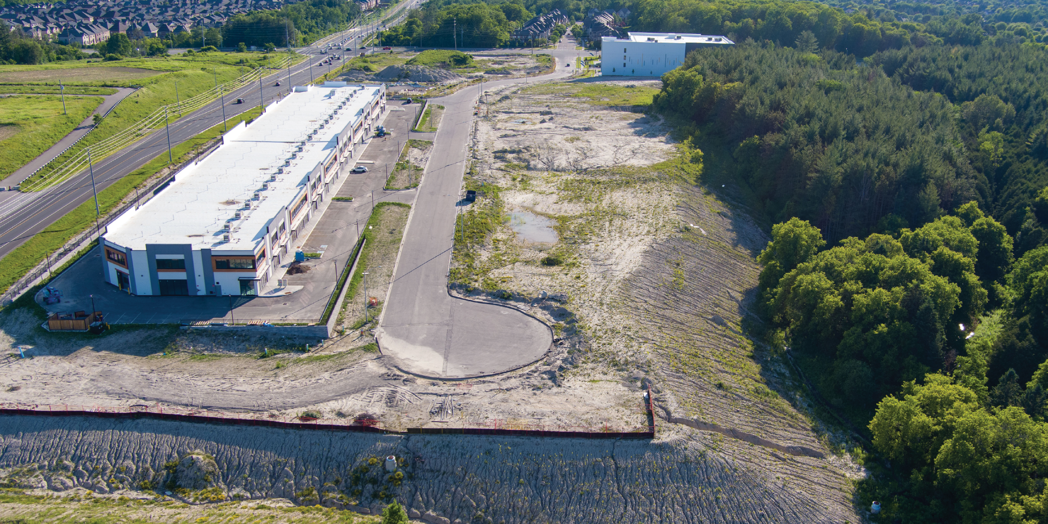 55, 100, 140, 160 Melvin Robson Ave Aerial photo from East