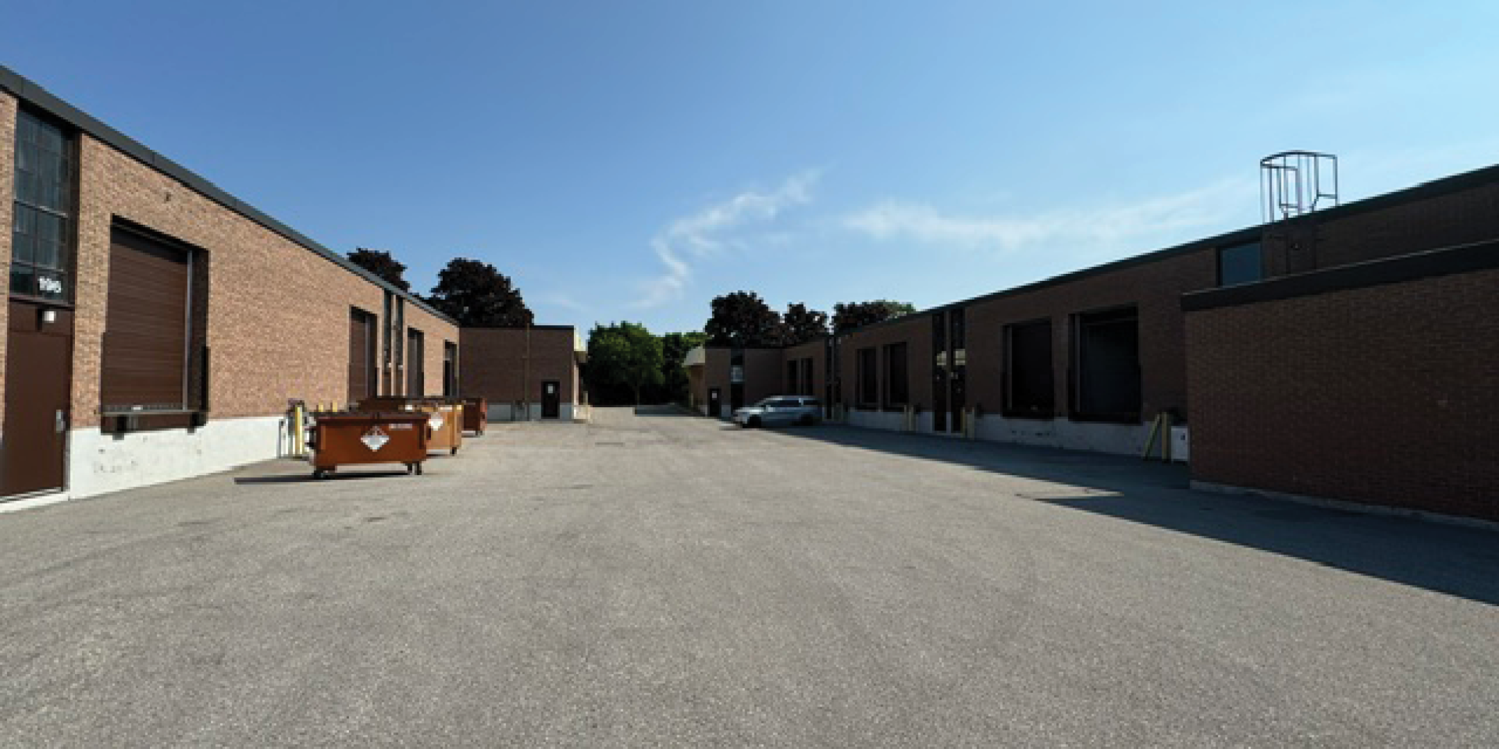 Back exterior of 230 Wildcat Road shows neighbouring units