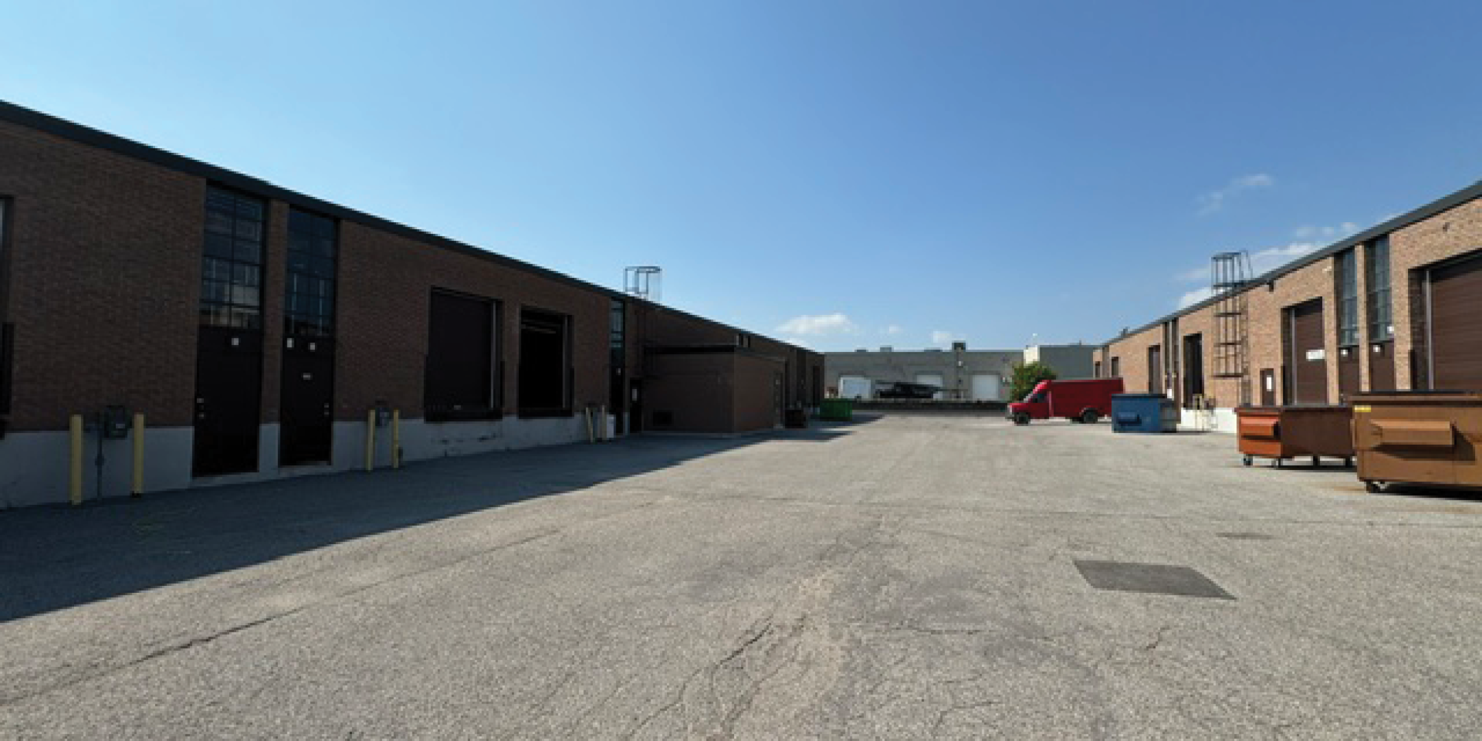Back exterior of 230 Wildcat Road shows neighbouring units
