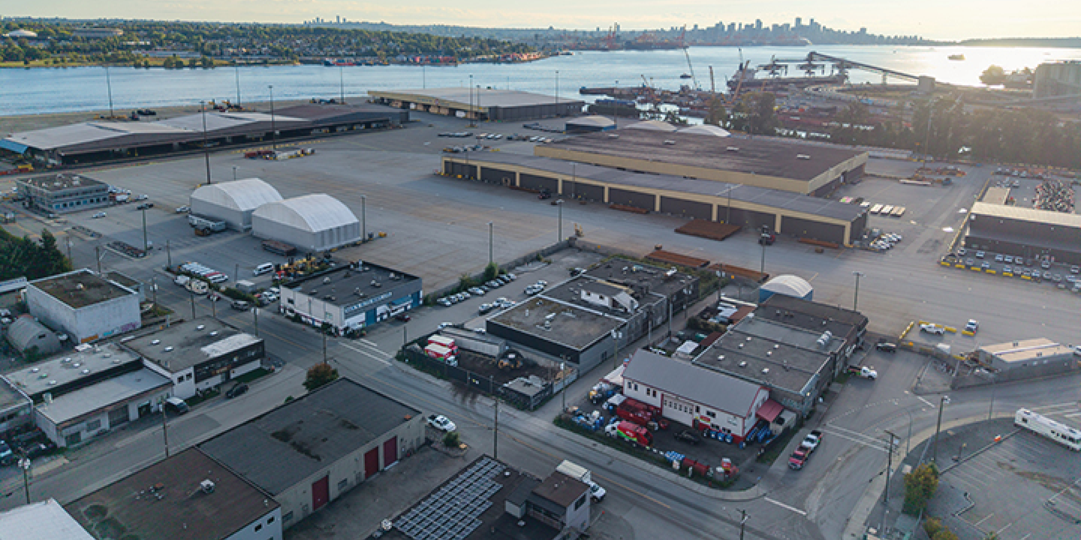Aerial View of 1490 Columbia Street, including the industrial yard and showing the view of Vancouver