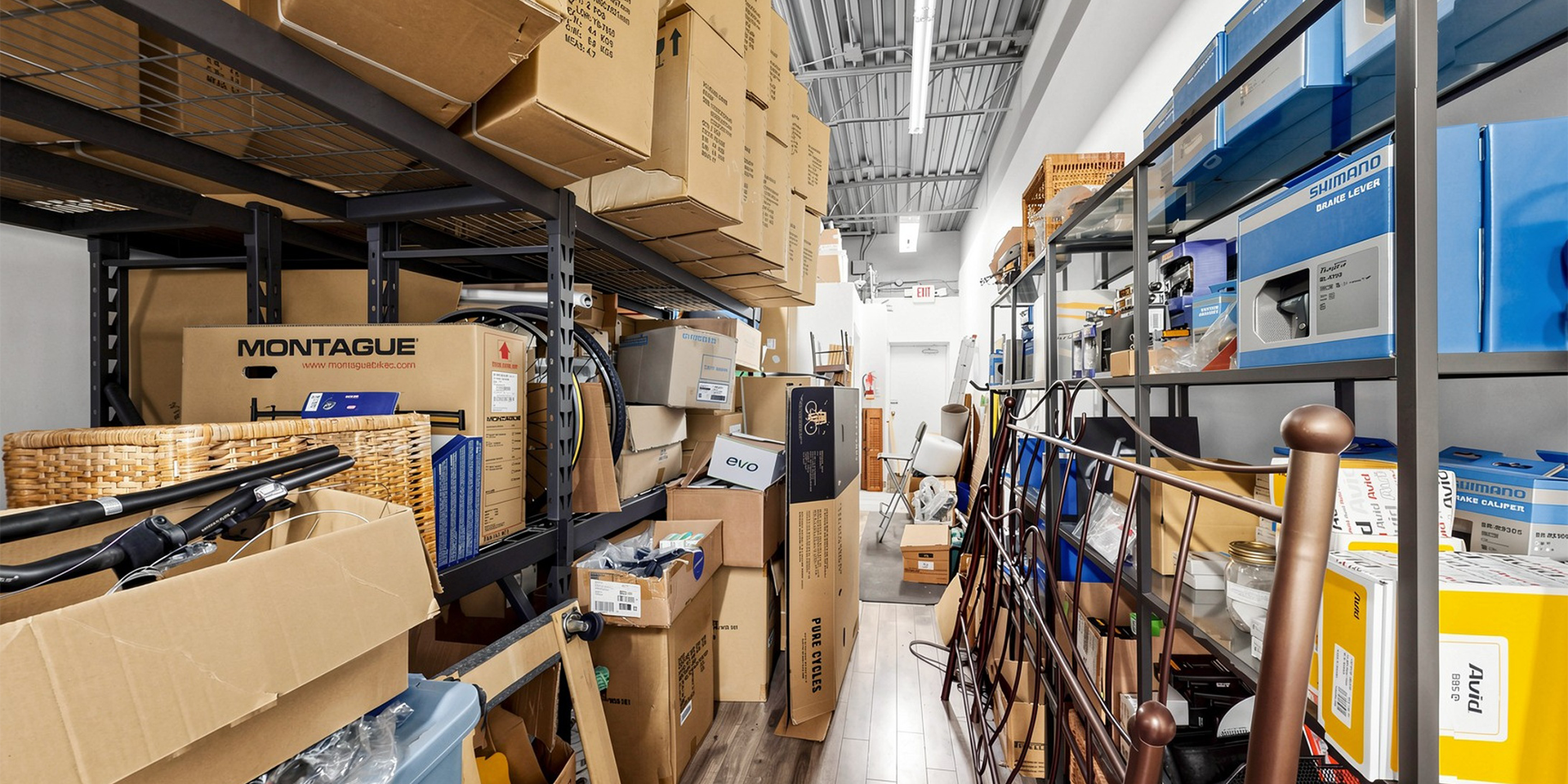 1150 Lorne Park Road Unit 2 - Store interior showing storage room with shelves of boxes