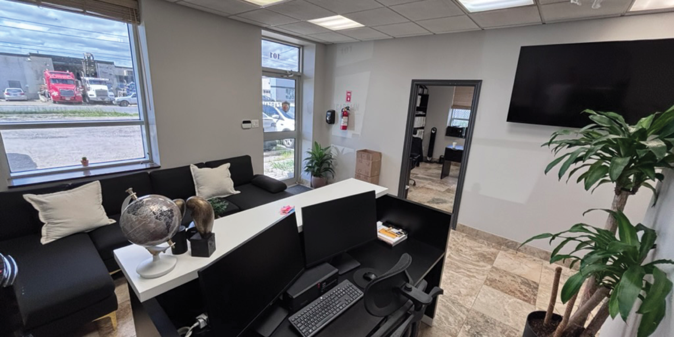 76 Millwick Drive, Unit 101 Interior - Office Area with large windows, desk and chairs
